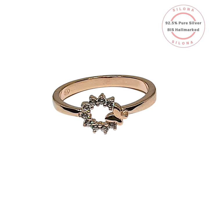 Celestial-inspired rose gold ring featuring a sparkling cubic zirconia sun motif and a polished moon accent on a 92.5 silver band.