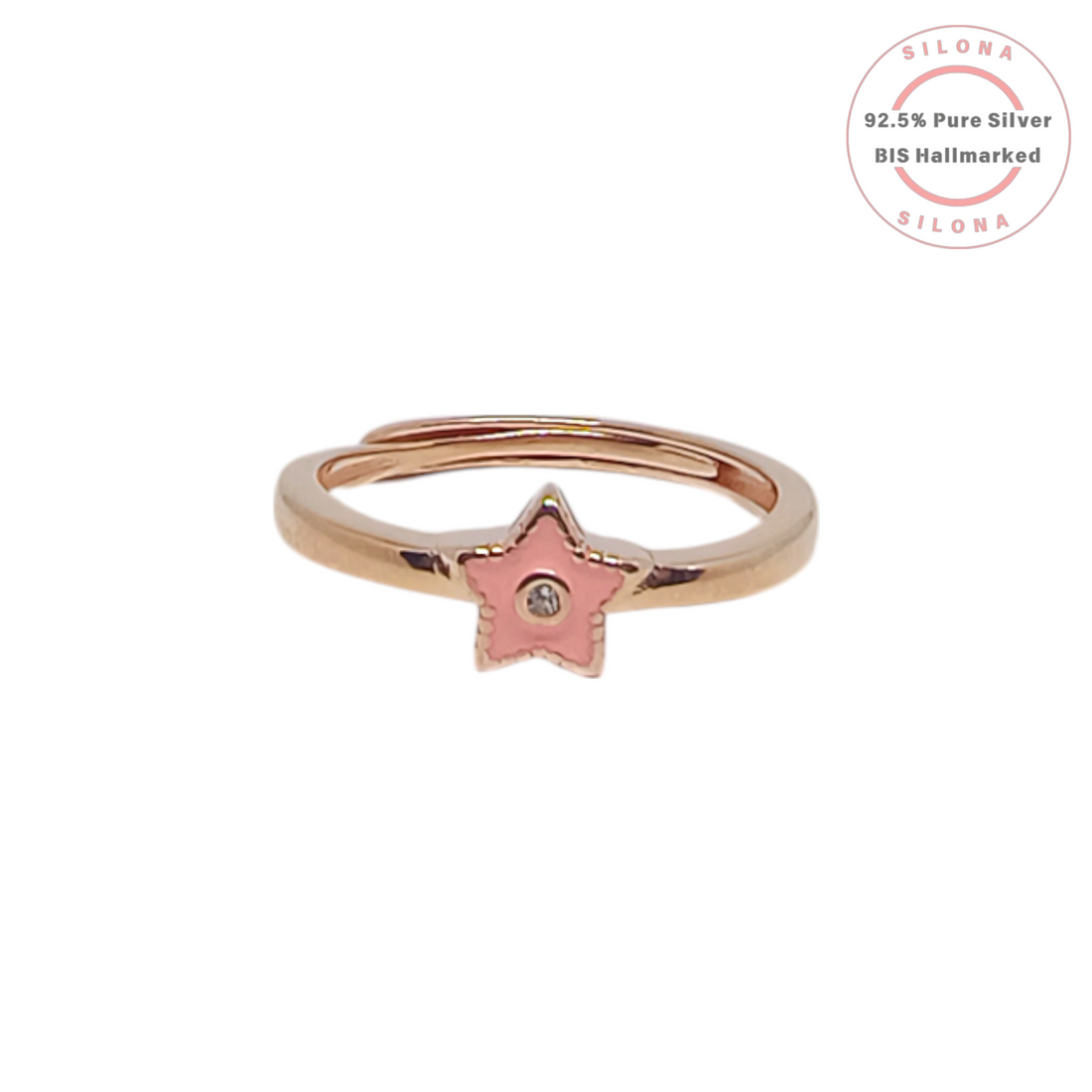 Silona's adjustable rose gold ring featuring a pink enamel star motif with a central cubic zirconia stone on a white background.