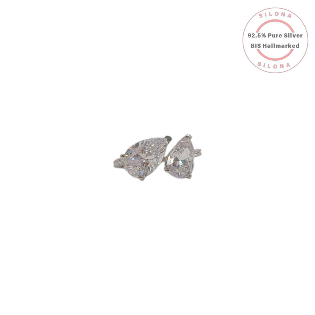 A modern Toi et Moi style ring crafted in 92.5 silver, featuring two large, pear-cut cubic zirconia stones on a white background.