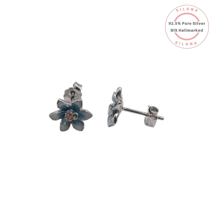 A pair of Silona's Dusky Blue Daffodil stud earrings in 92.5 sterling silver, shown on a white background.