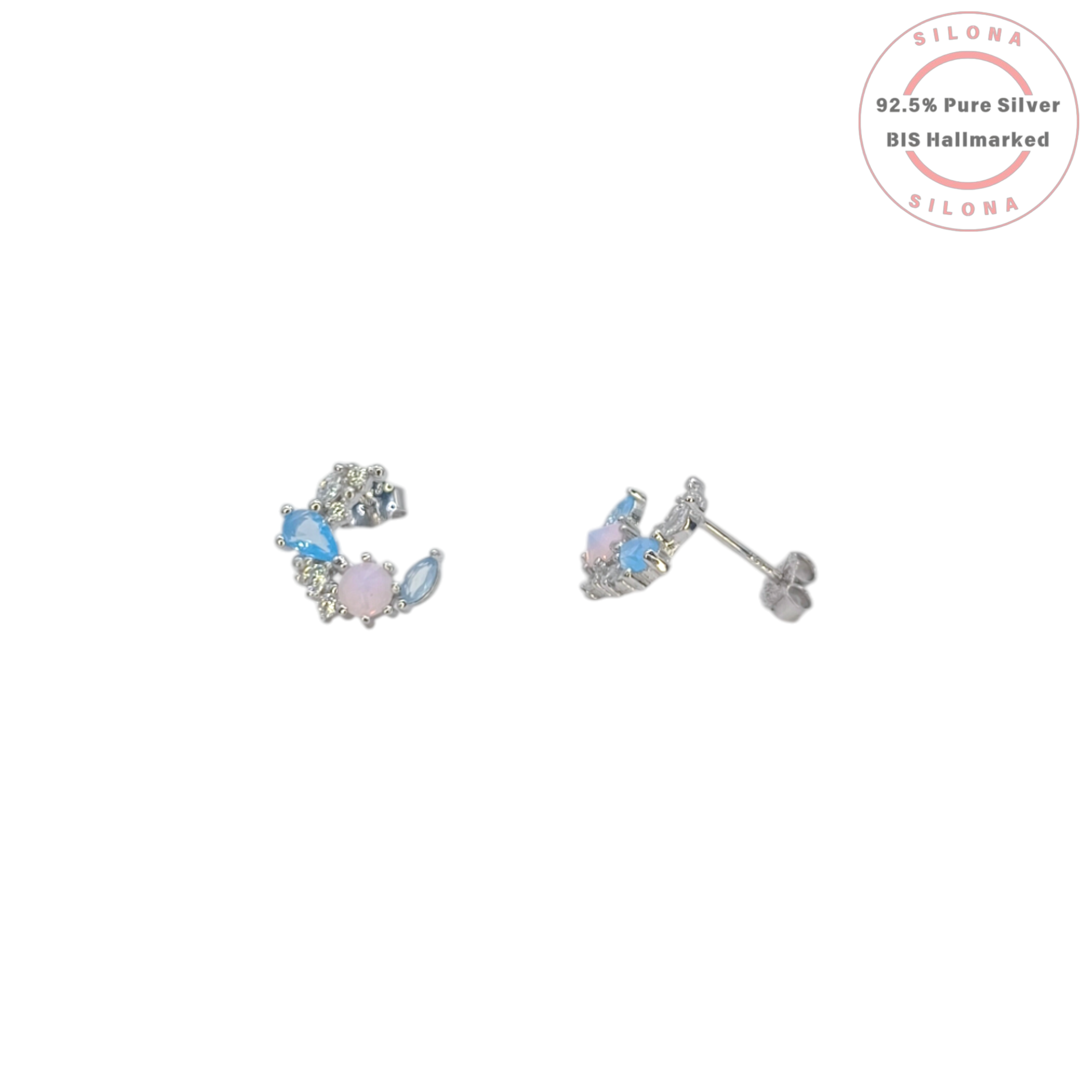 Pair of Pastel Aurora Crescent Stud Earrings in 92.5 silver, featuring a cluster of blue, pink, and clear cubic zirconia stones on a white background.