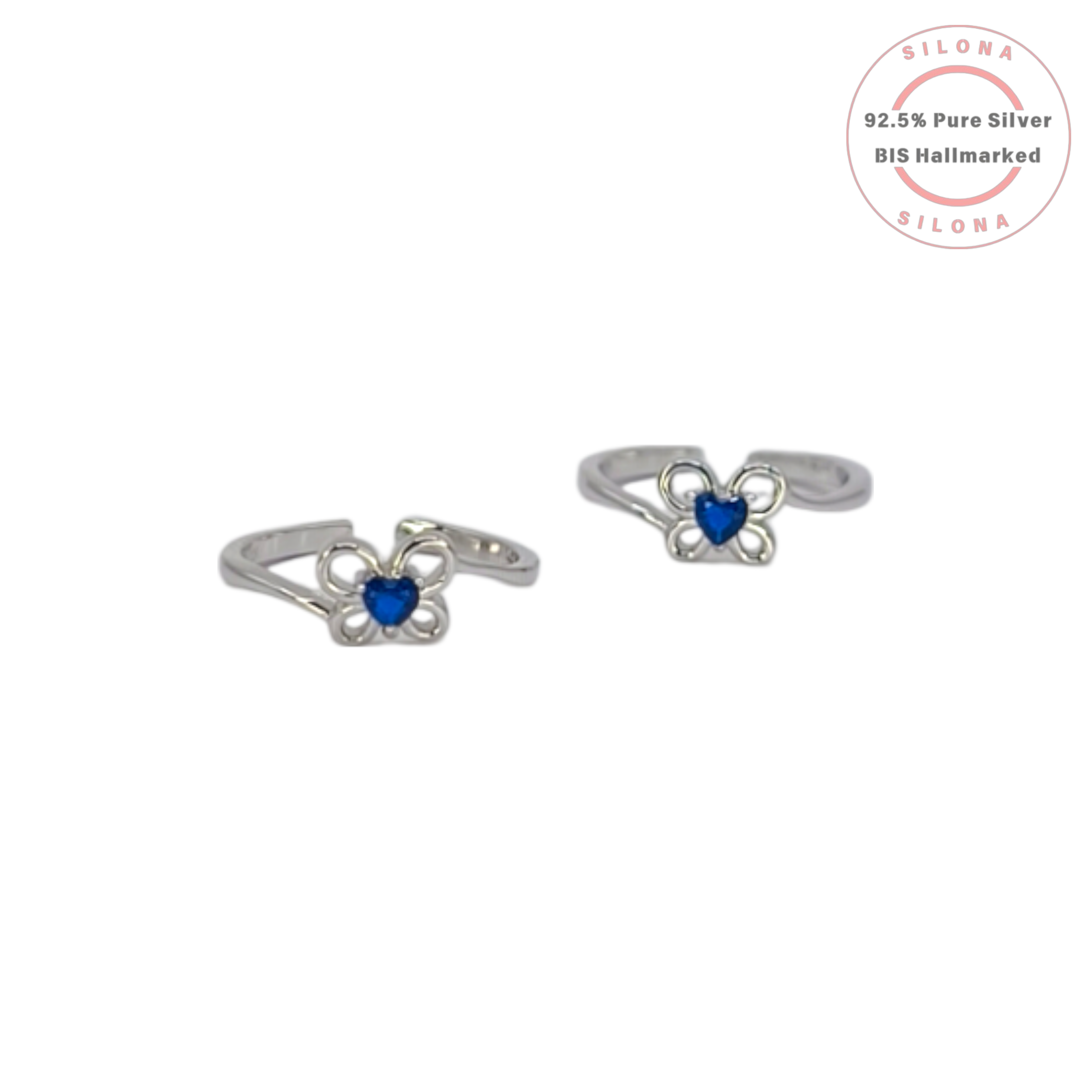 A pair of adjustable silver toe rings, each featuring a delicate butterfly motif with a central heart-shaped sapphire-blue stone, on a white background.