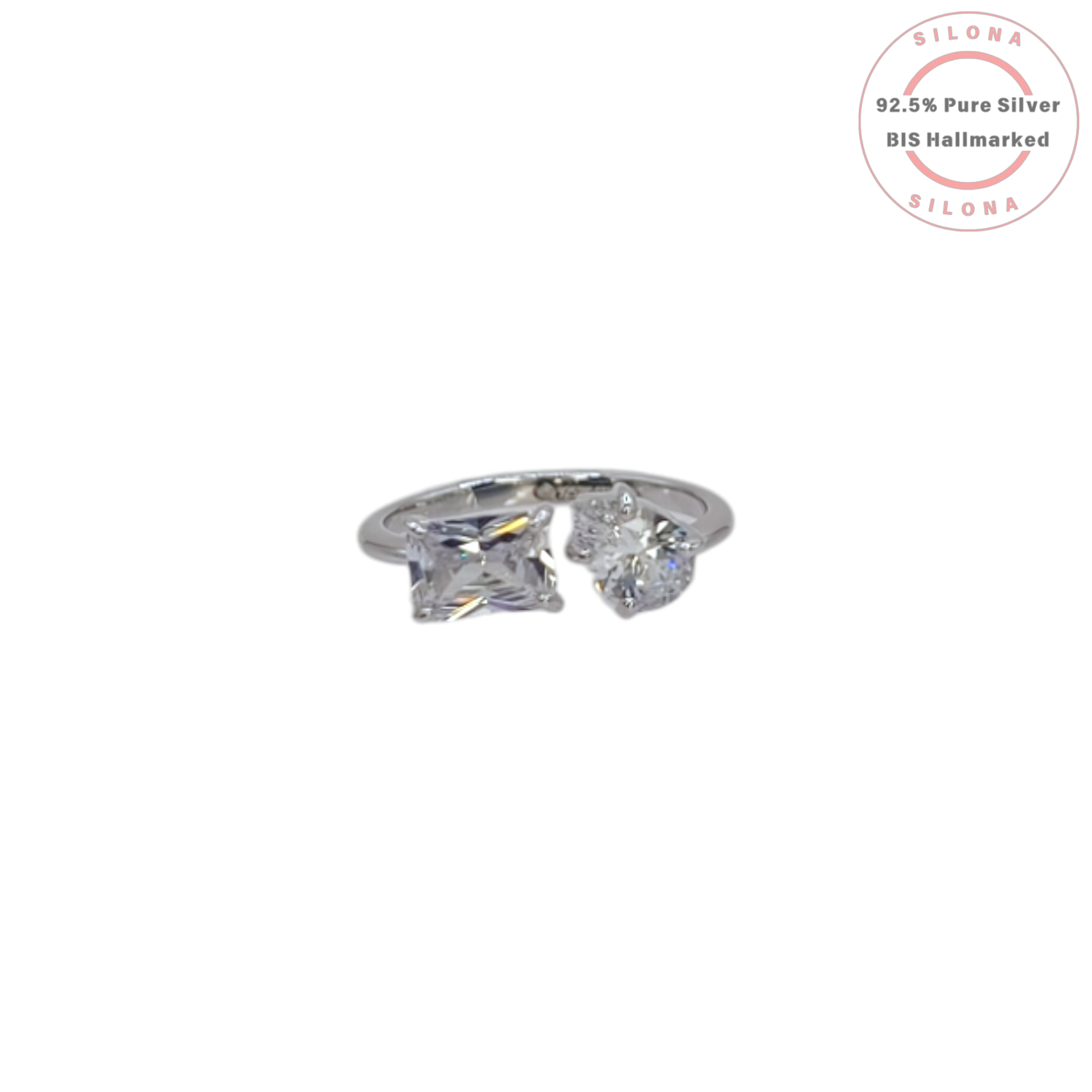 Silona Toi et Moi open ring in 92.5 silver, featuring a heart-shaped and an emerald-cut cubic zirconia stone on a white background.
