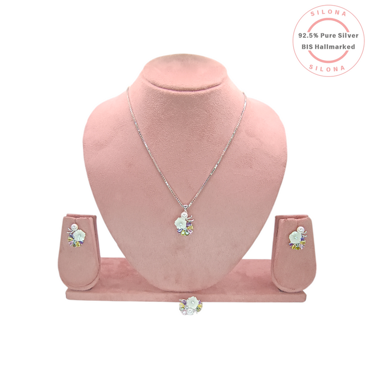 Silona Pastel Enamel Bloom Necklace and Earring Set in 92.5 silver, displayed on a pink bust.