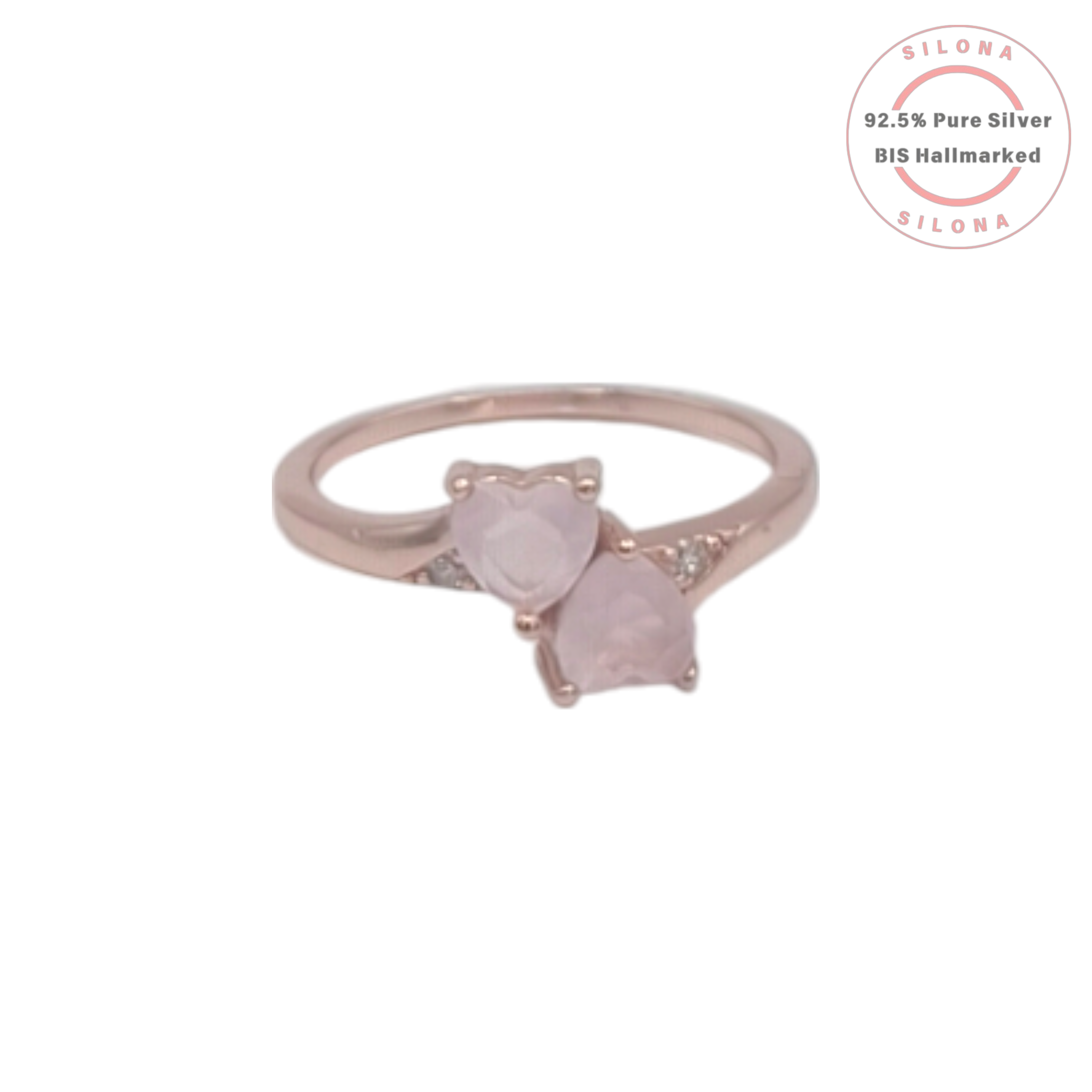 Toi et Moi style ring with two heart-shaped pink rose quartz stones on a rose gold plated 92.5 silver band.