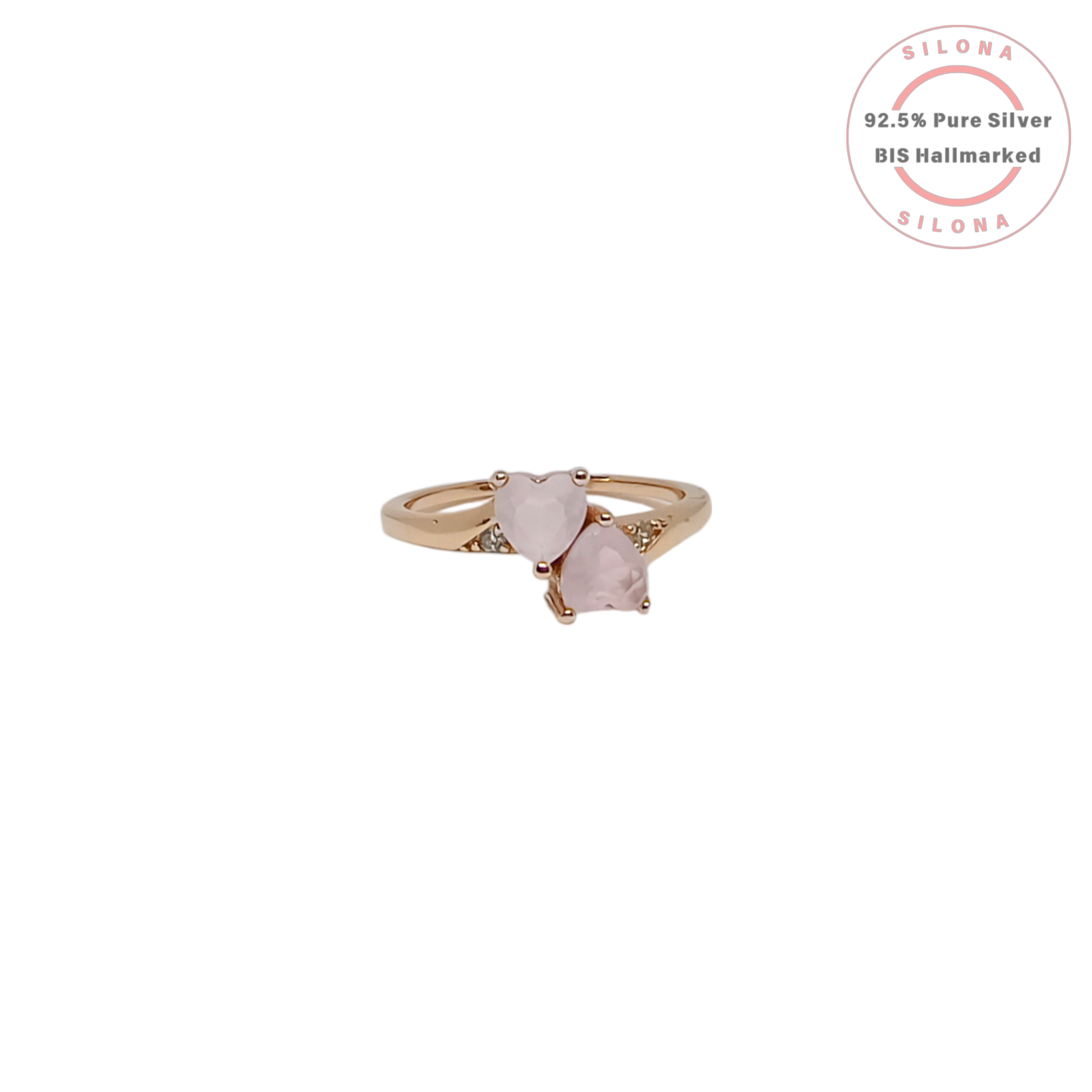 Toi et Moi style ring with two heart-shaped pink rose quartz stones on a rose gold plated 92.5 silver band.