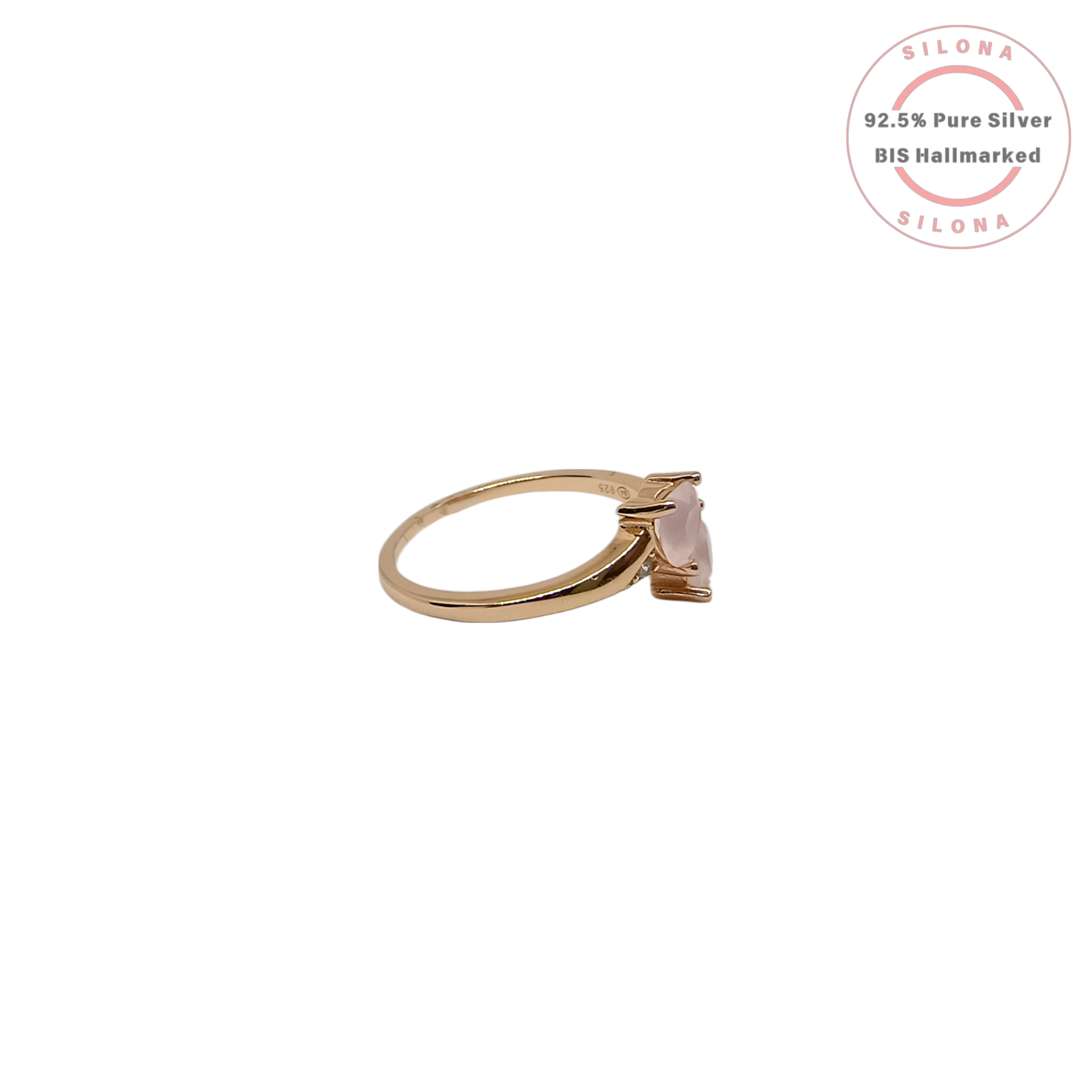 Toi et Moi style ring with two heart-shaped pink rose quartz stones on a rose gold plated 92.5 silver band.