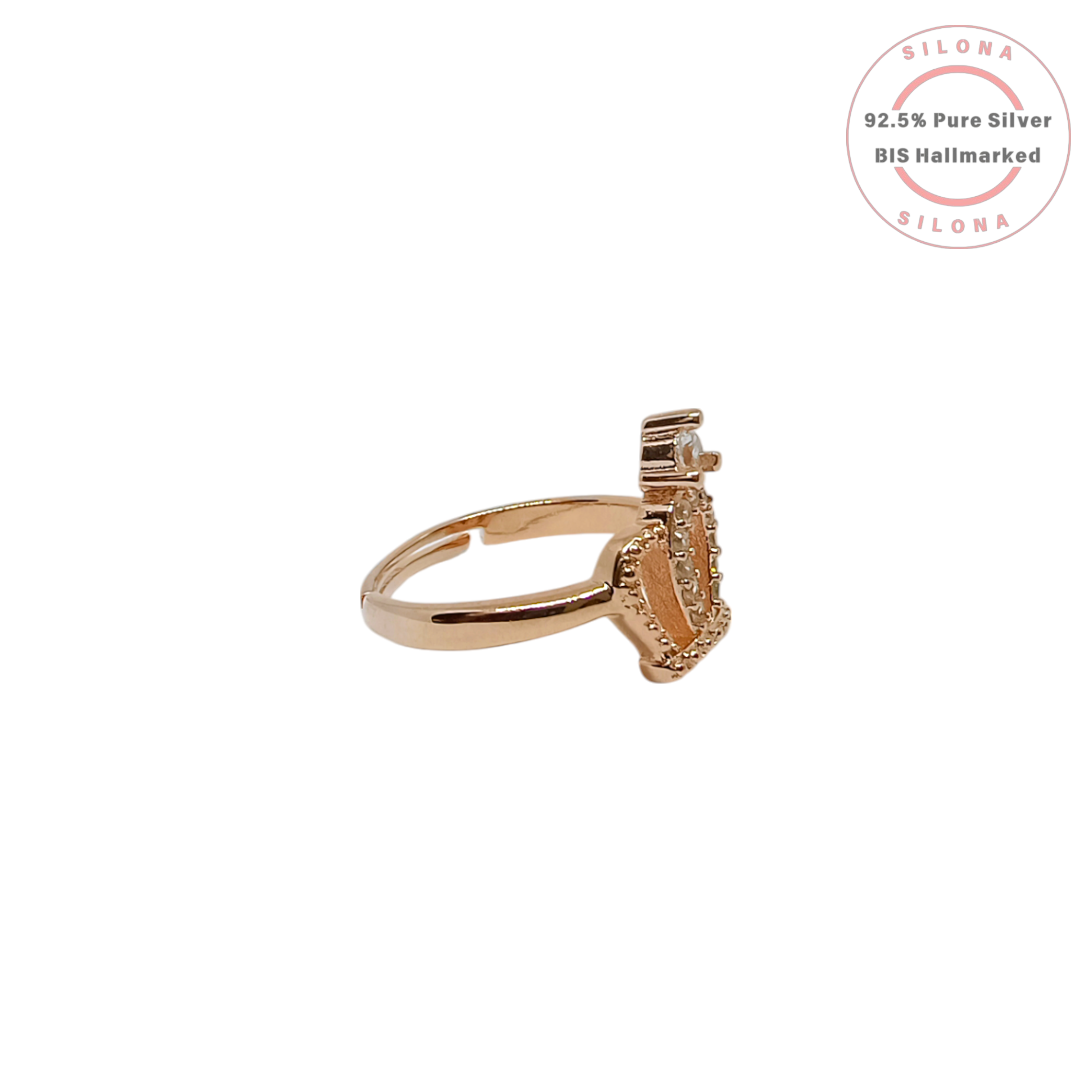 A close-up of the Silona Regal Crown Ring, featuring a rose gold plated silver band with a crown motif set with sparkling cubic zirconia stones, on a white background.