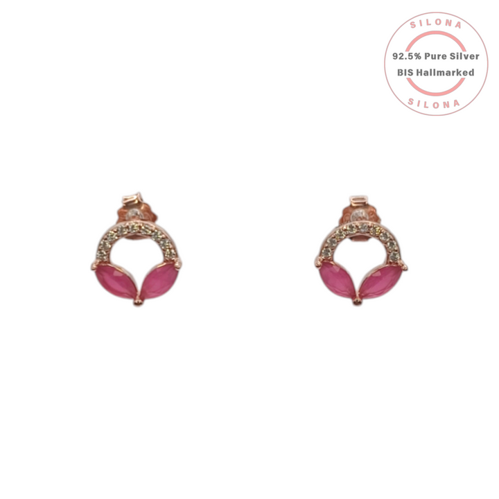 A pair of rose gold plated silver stud earrings featuring a halo of clear cubic zirconia surrounding two marquise-cut pink stones that form a petal design.