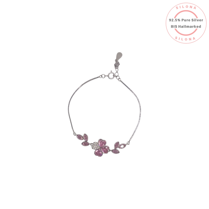 Silona's Floral Heart Petal Bracelet in 92.5 silver, featuring pink and clear cubic zirconia on a delicate box chain against a white background.