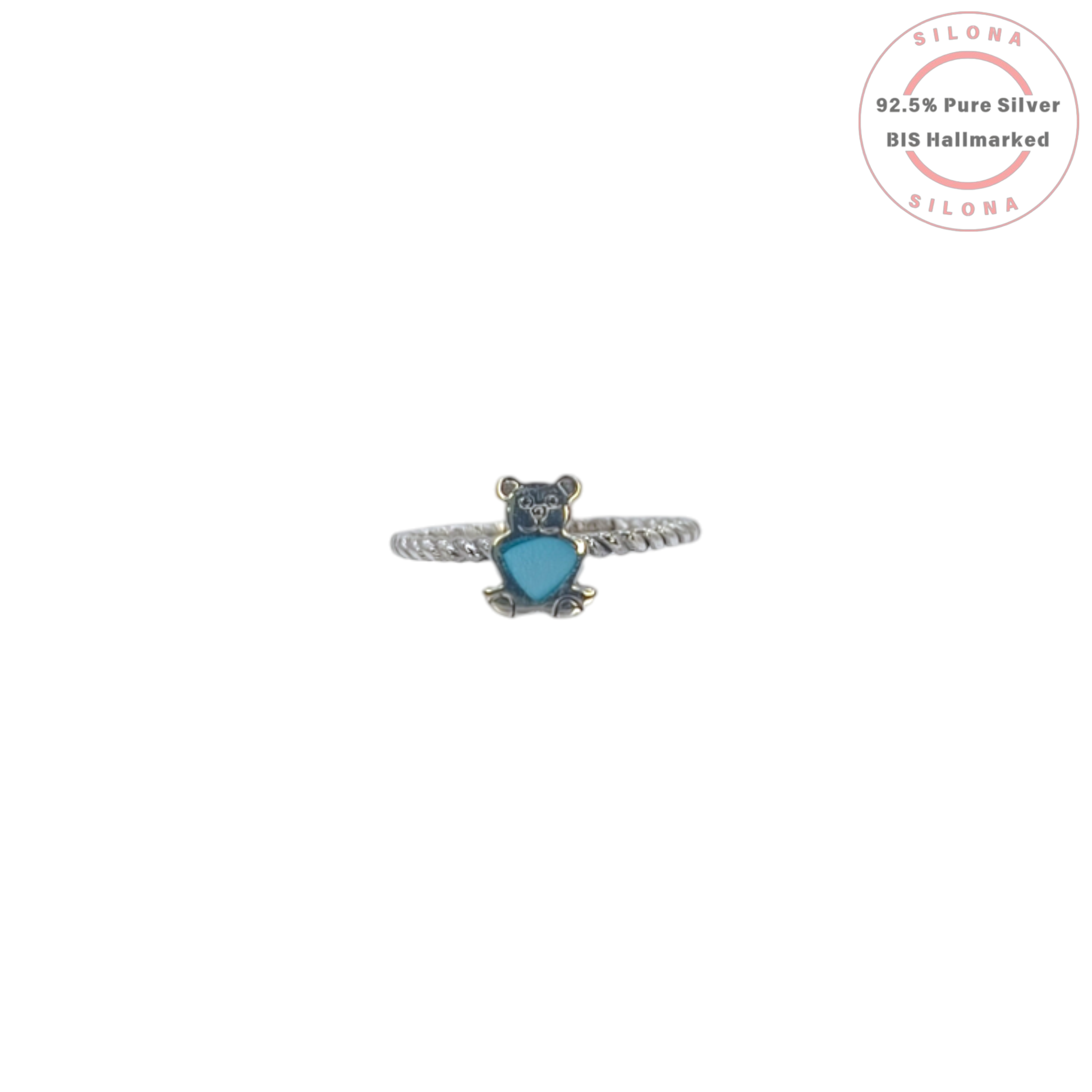 A whimsical teddy bear ring with a vibrant turquoise heart, crafted from 92.5 sterling silver with a twisted band design.