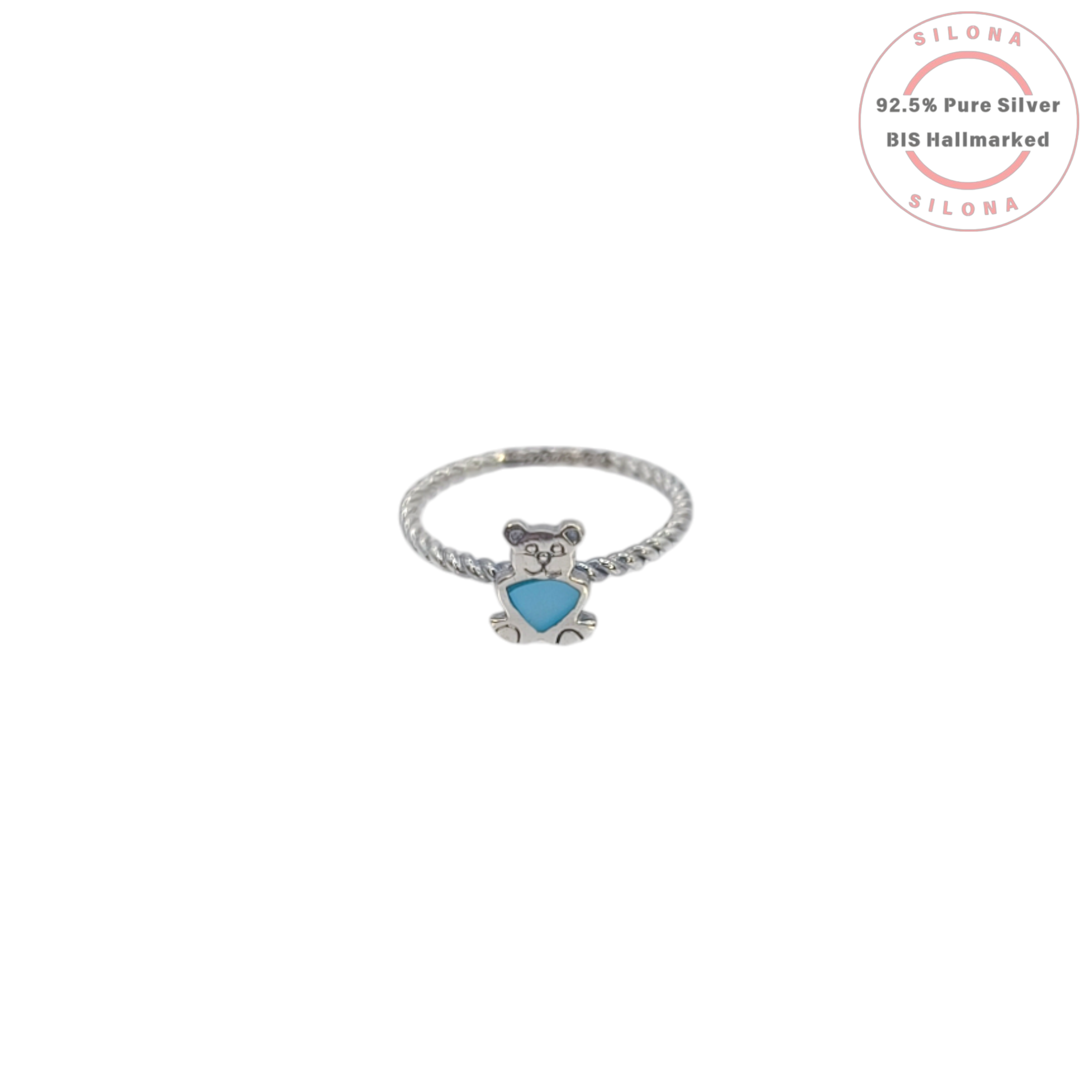 A whimsical teddy bear ring with a vibrant turquoise heart, crafted from 92.5 sterling silver with a twisted band design.