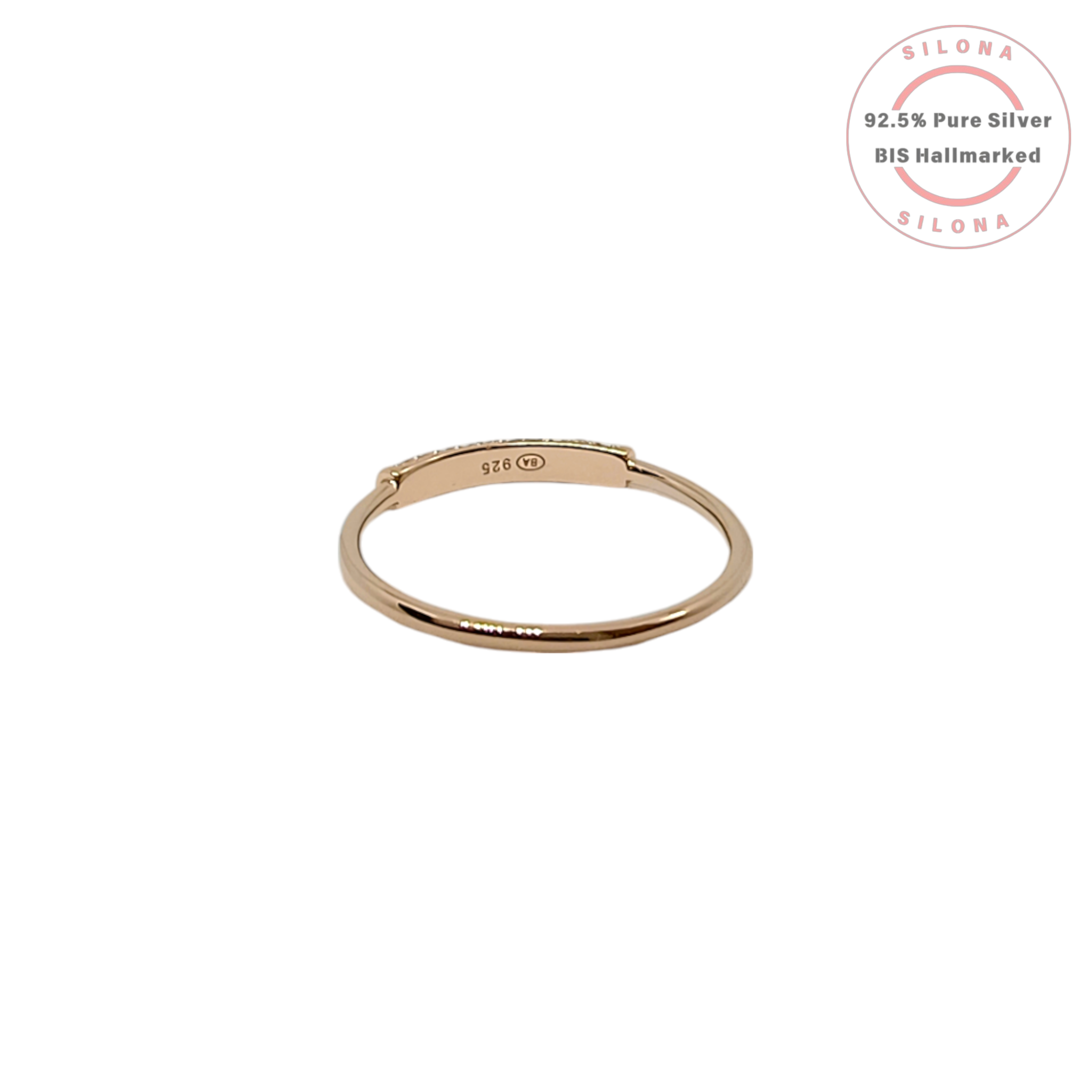 A minimalist pavé bar ring with champagne cubic zirconia, crafted in rose gold plated 92.5 silver, shown on a white background.
