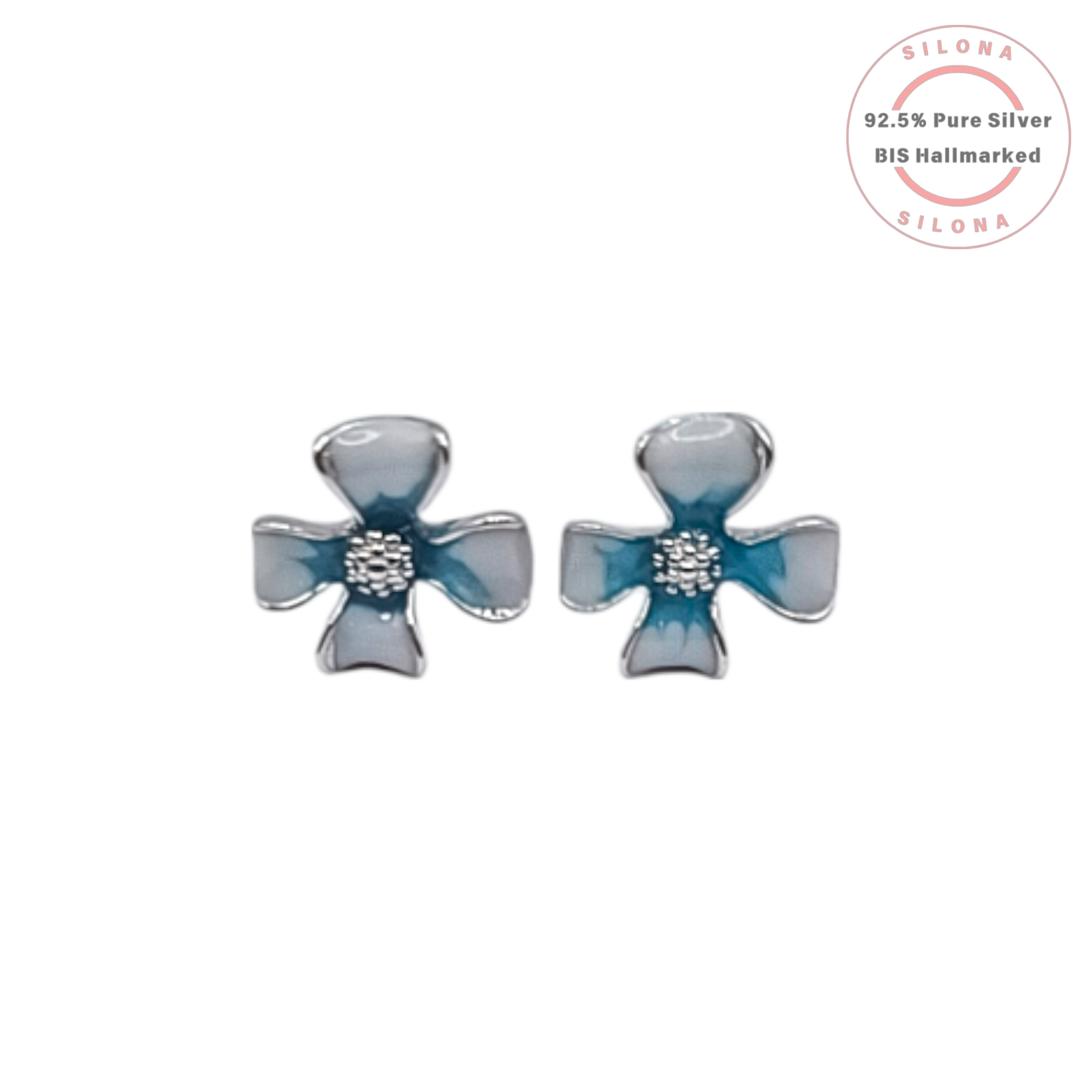 A pair of Azure Clover stud earrings made from 92.5 silver, with two-tone blue enamel petals and a central cubic zirconia cluster, on a white background.