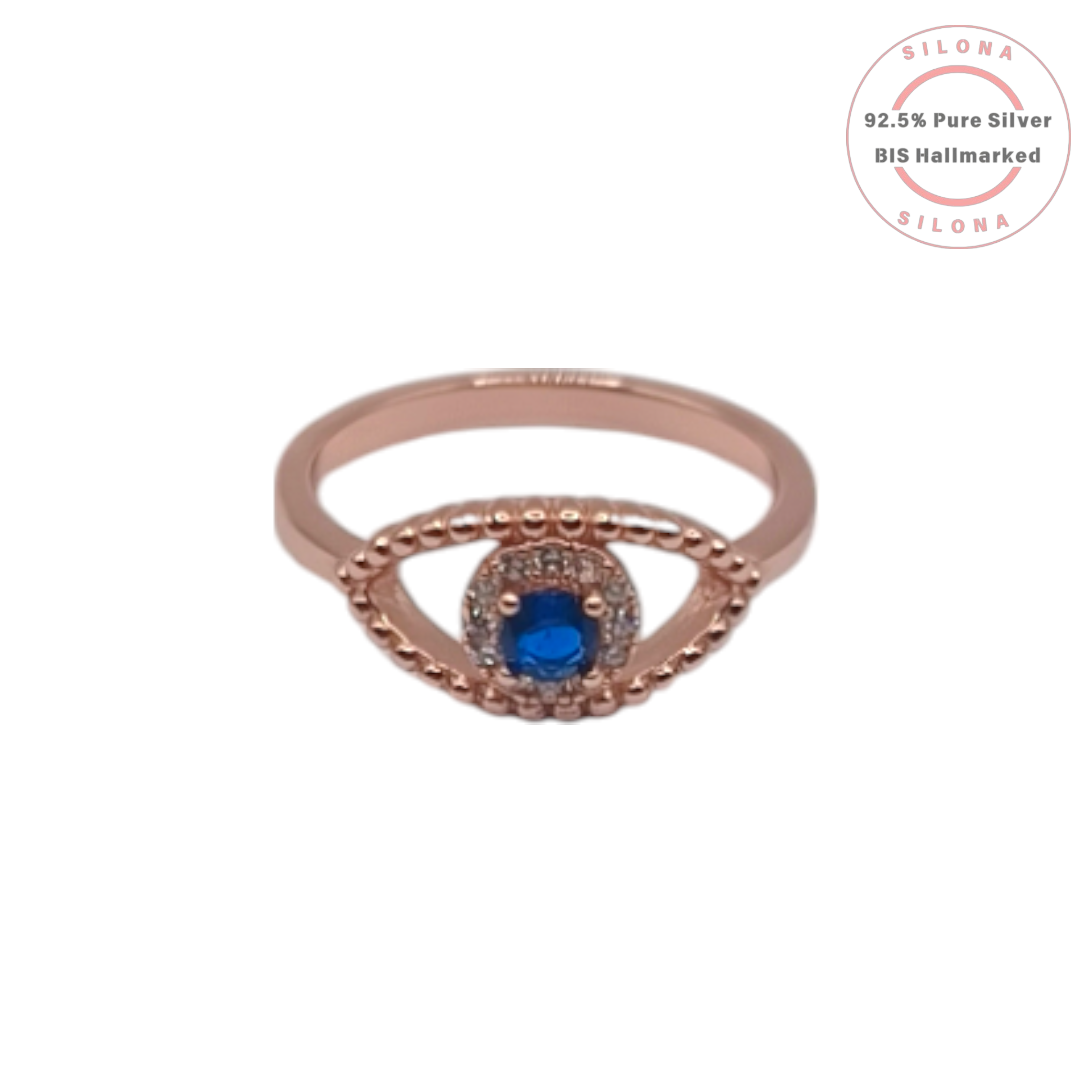 Silona Evil Eye Ring in a rose gold finish, featuring a central blue cubic zirconia with a halo, on a white background.