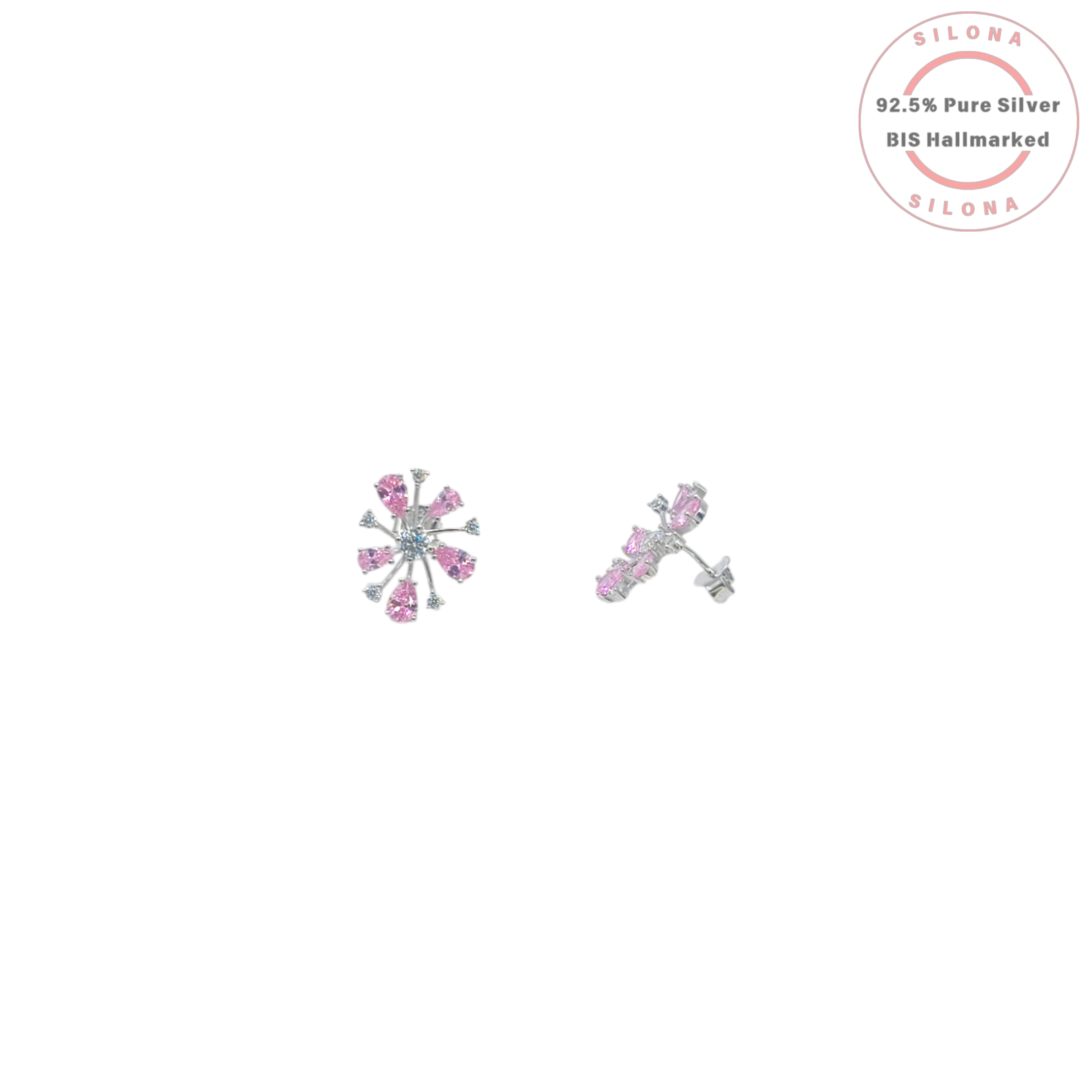 Pair of silver starburst stud earrings featuring pear-shaped pink cubic zirconia and small clear stones on a white background, with Silona brand hallmark.