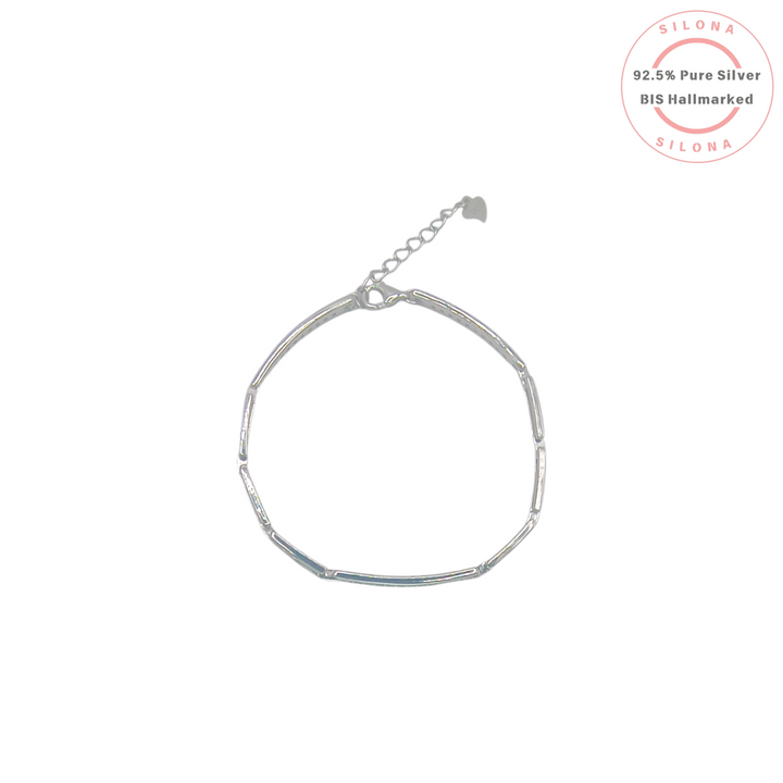 A minimalist silver bar link bracelet with an adjustable clasp, shown on a clean white background.