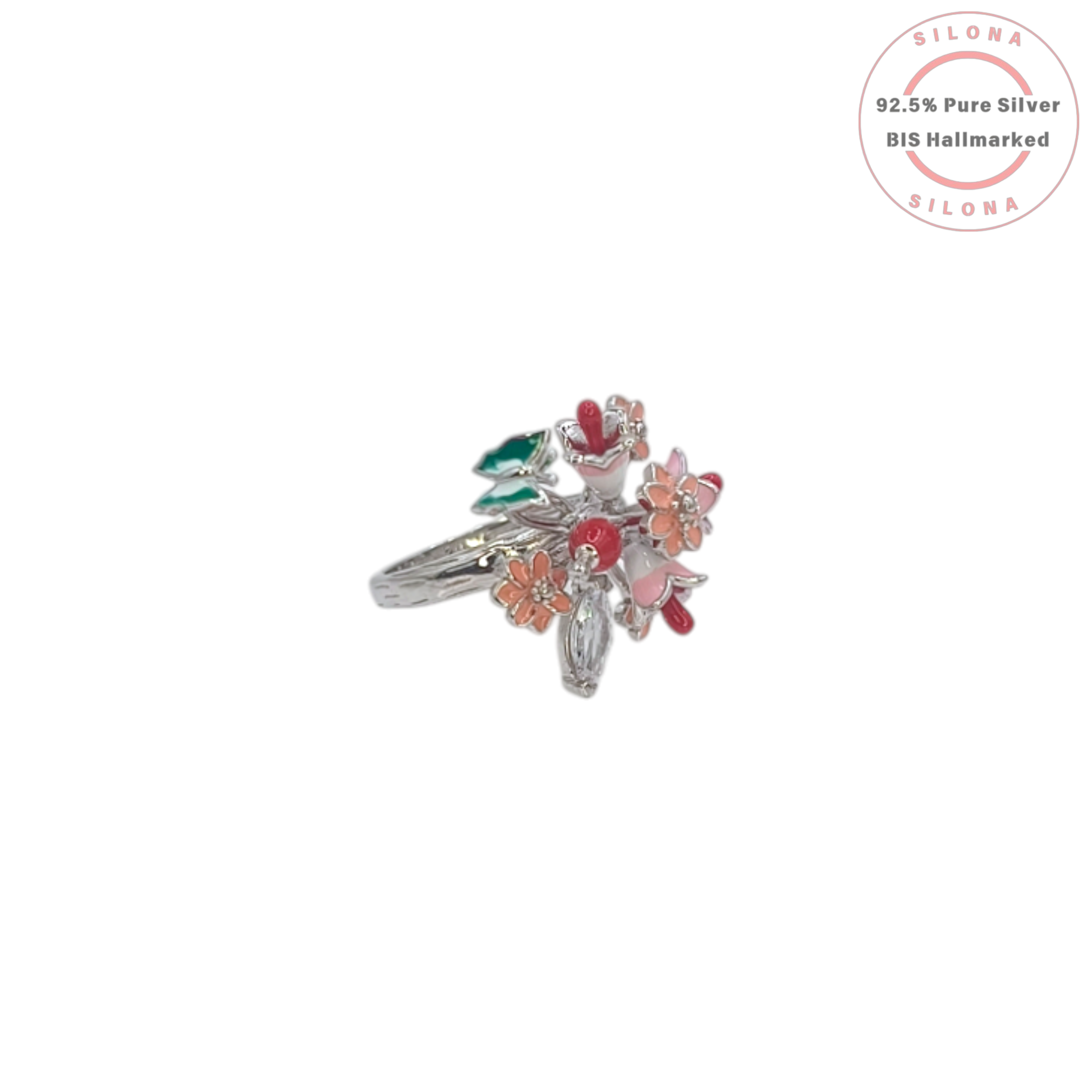 Silona's Enamel Hummingbird & Floral Bouquet Ring in 92.5 silver, featuring pink and coral enamel flowers, a small green bird, and marquise-cut cubic zirconia stones on a white background.
