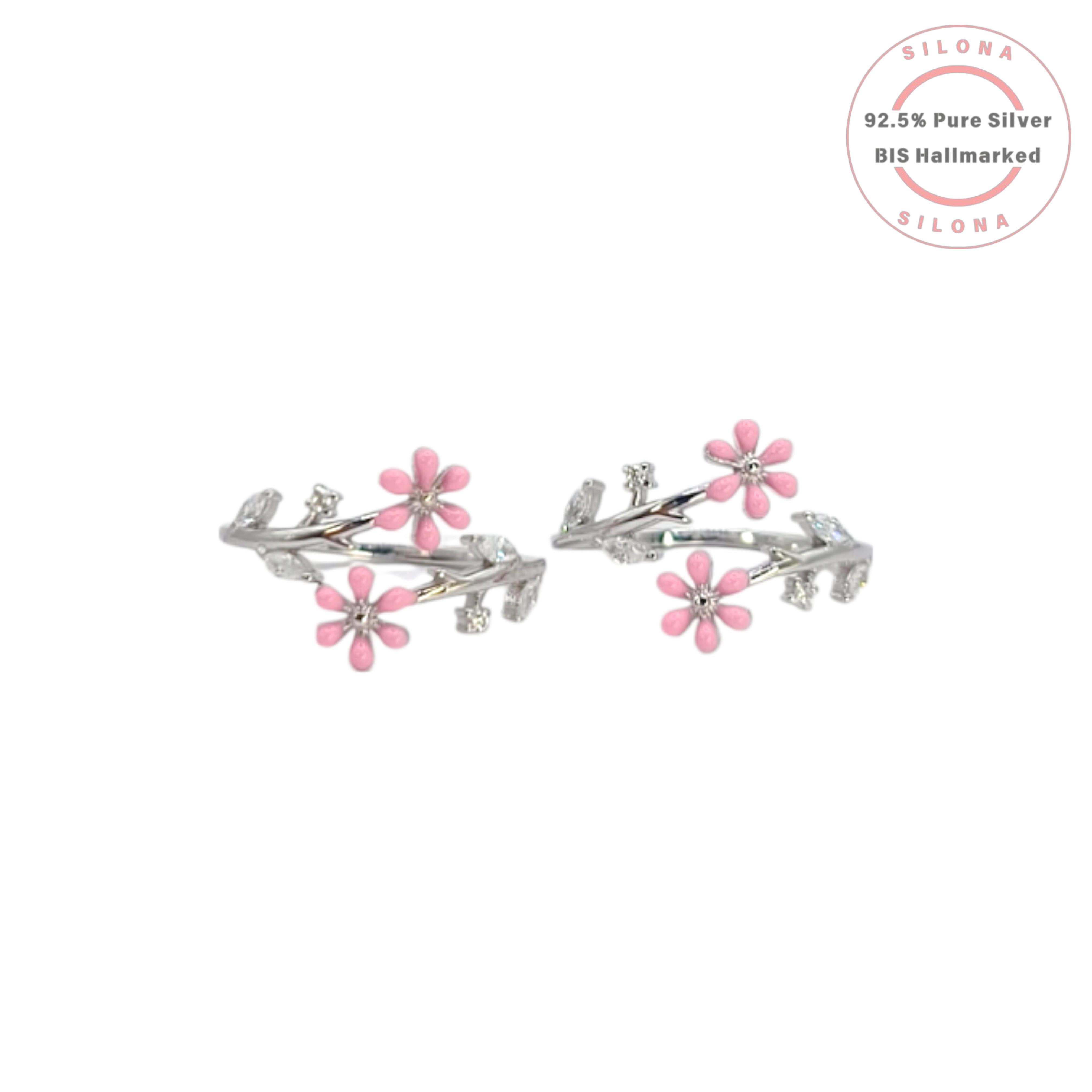 Pair of Dainty Pink Blossom Toe Rings in 92.5 silver, featuring pink enamel flowers and clear stone leaves on a white background.