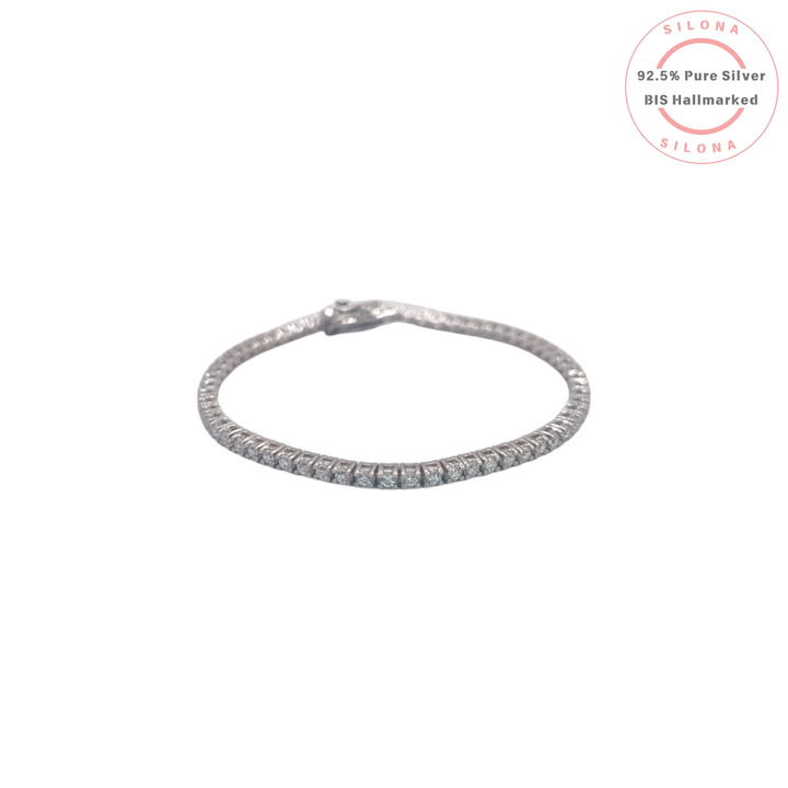 Classic silver tennis bracelet with a single row of brilliant-cut cubic zirconia stones on a white background.