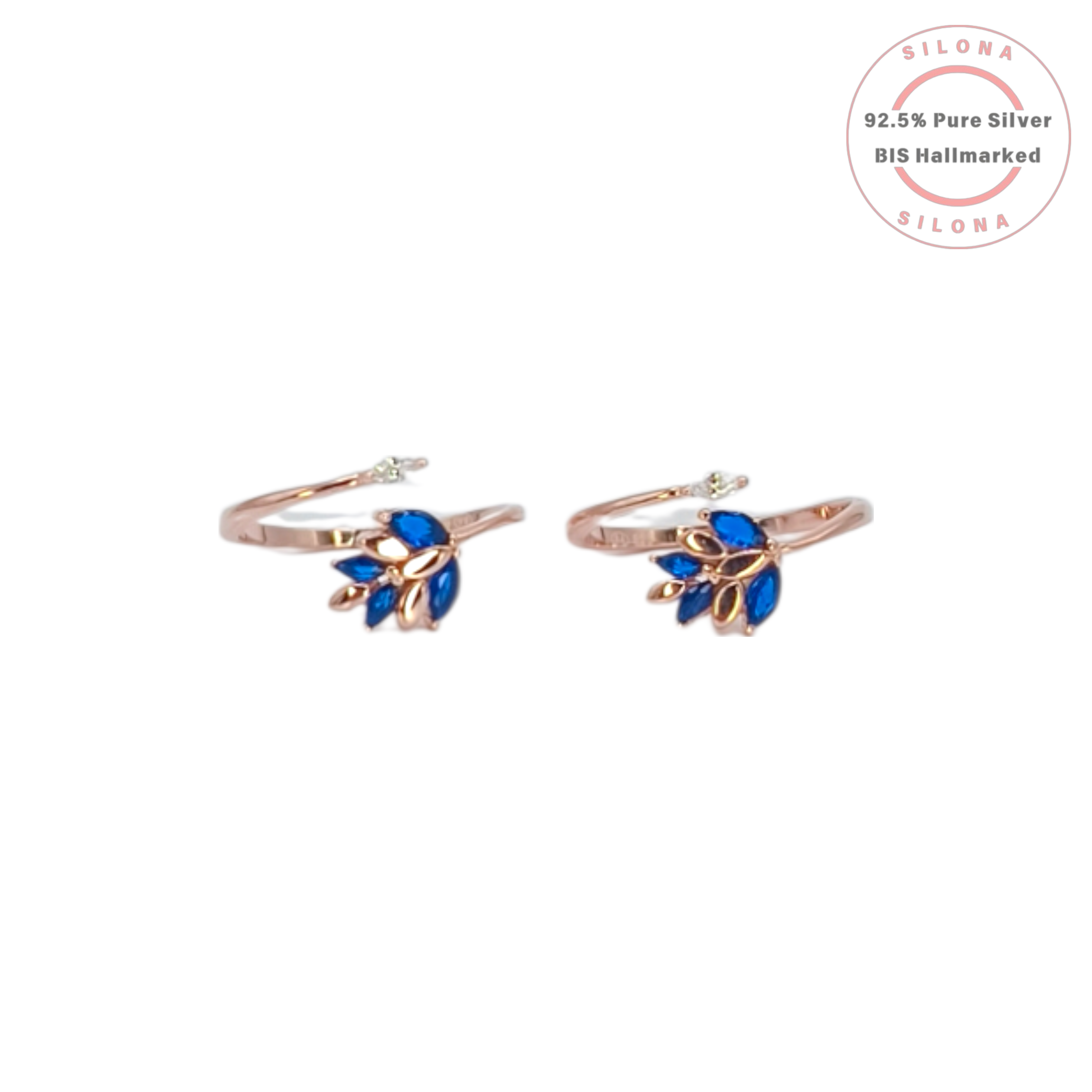 Pair of rose gold plated 92.5 silver toe rings with a floral leaf motif made of sapphire-blue marquise stones, on a white background.
