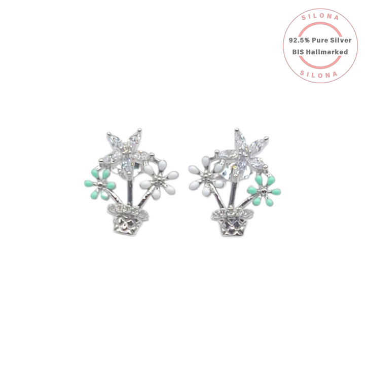 A pair of Silona silver stud earrings shaped like a flower pot, featuring marquise-cut cubic zirconia and flowers with mint green and white enamel.