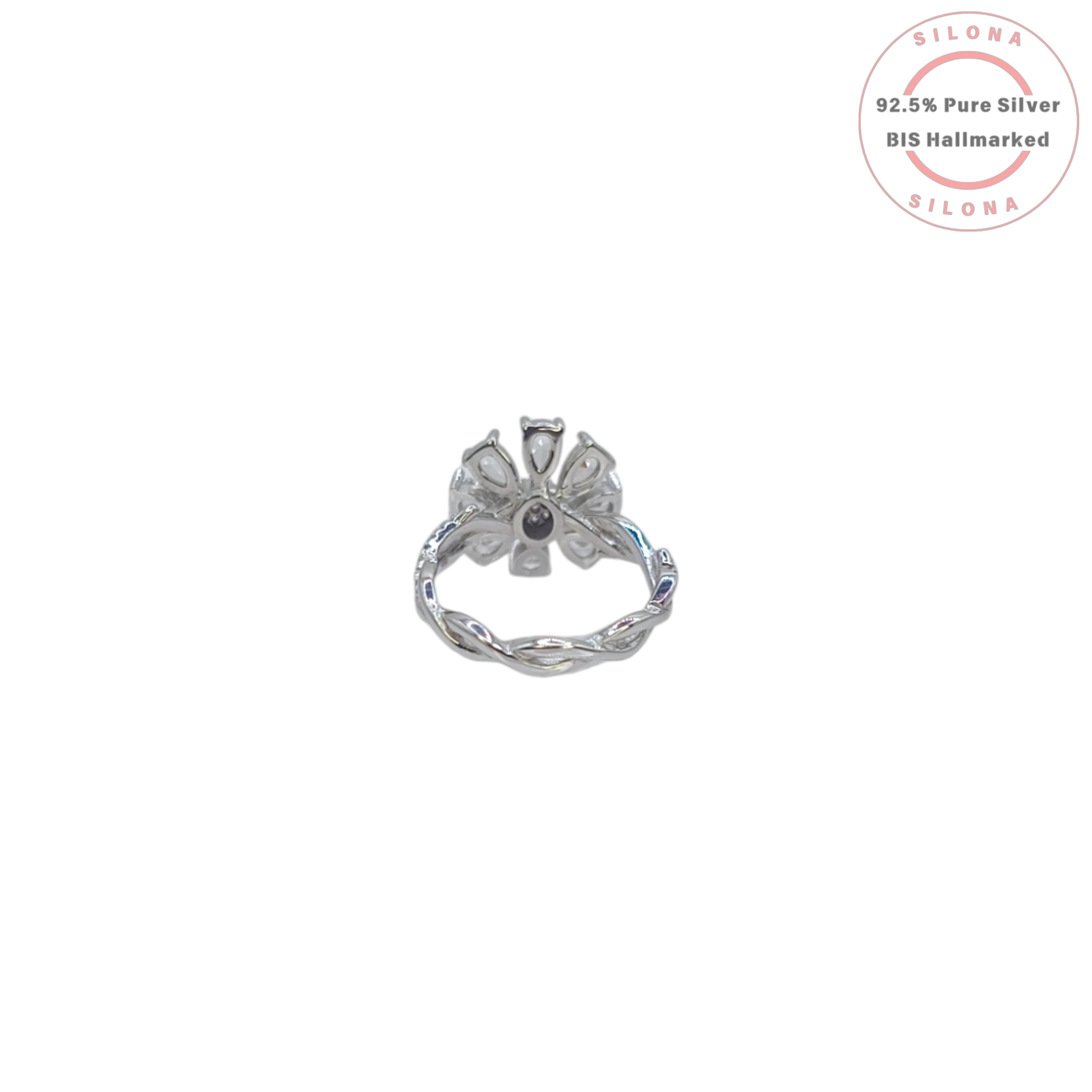 A silver Twisted Blossom Pave Ring with clear, pear-shaped cubic zirconia petals and a pink pave centre, on a white background.