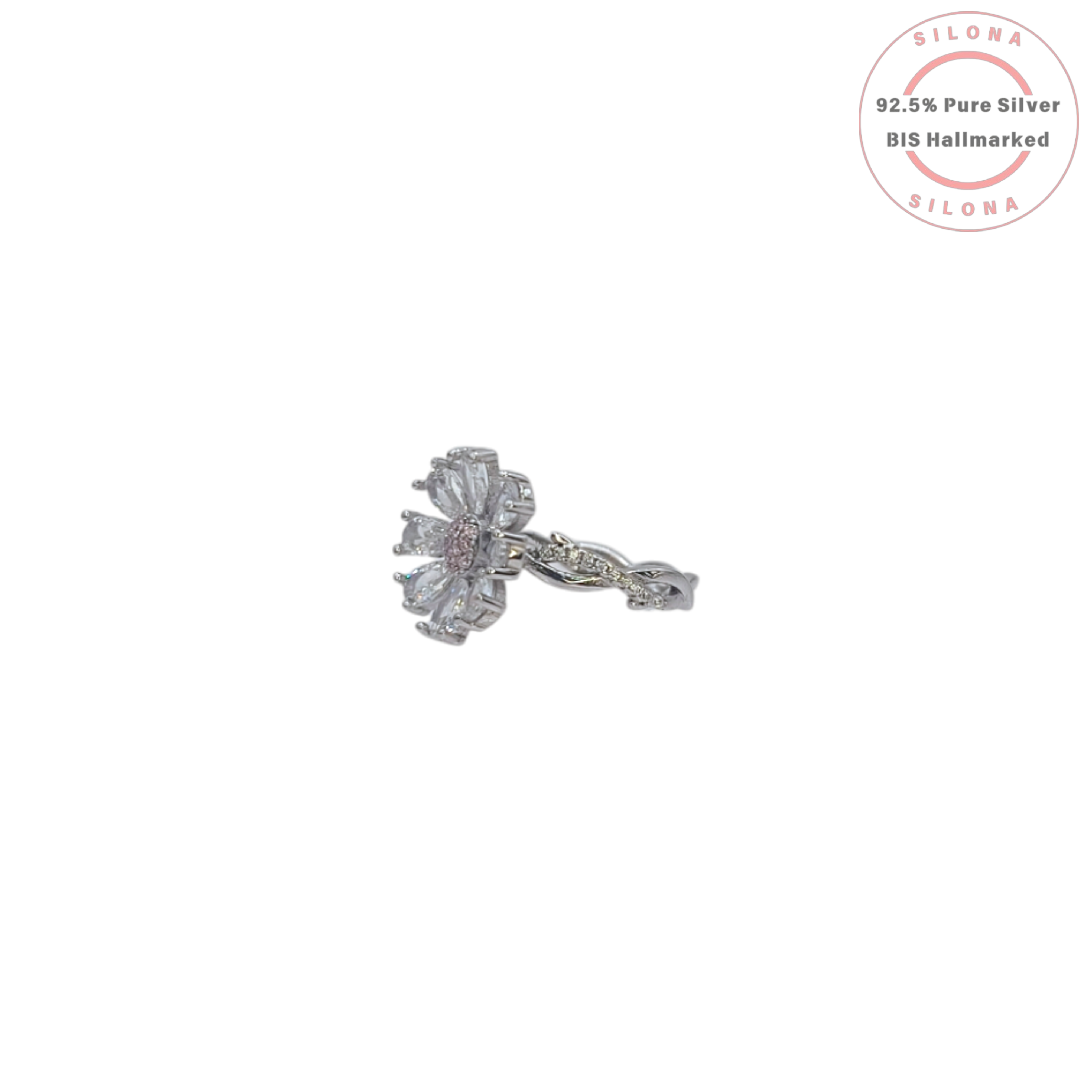 A silver Twisted Blossom Pave Ring with clear, pear-shaped cubic zirconia petals and a pink pave centre, on a white background.