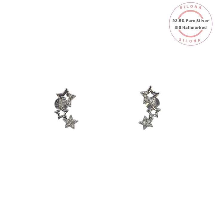 Pair of Celestial Star Cluster Stud Earrings in 92.5 silver, with pave cubic zirconia and polished star details, on a white background.