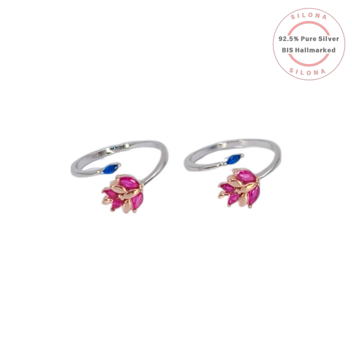 Pair of Silona's Vivid Bloom Floral Toe Rings in 92.5 silver, featuring a cluster of pink stones and a single blue stone on an adjustable band, shot on a white background.