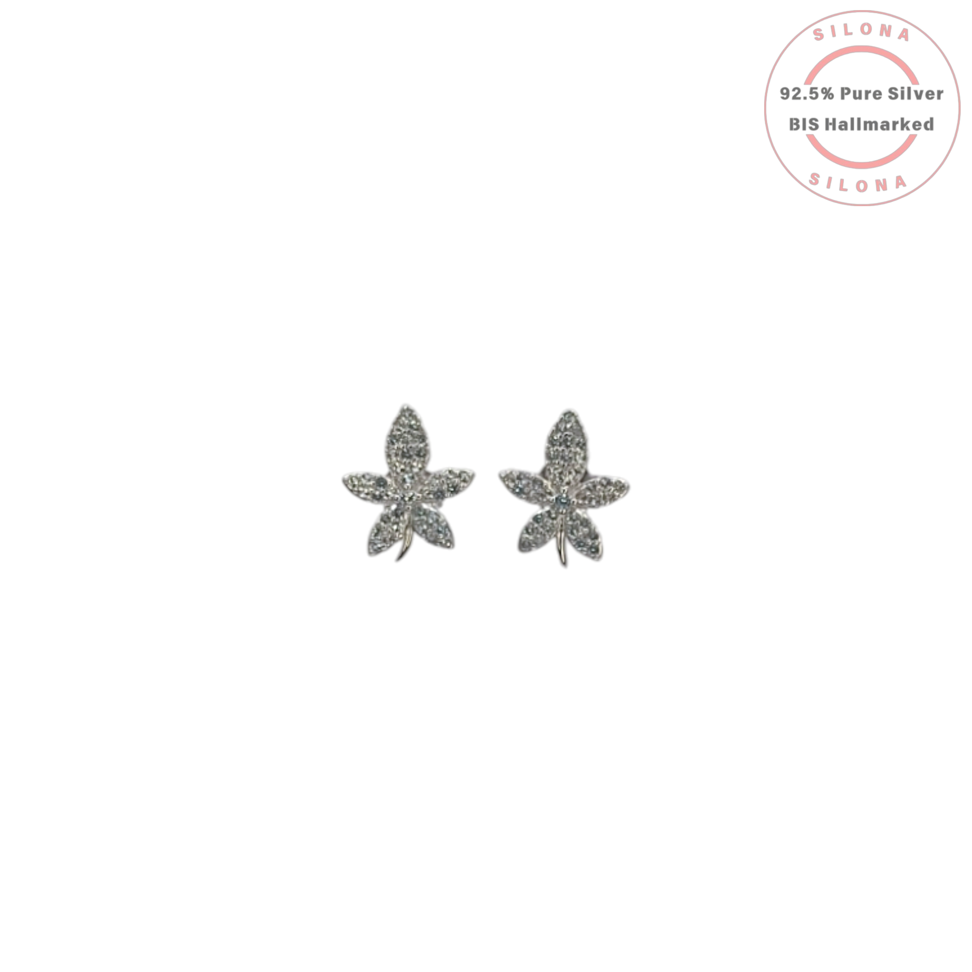 A pair of silver floral stud earrings, fully paved with sparkling cubic zirconia, on a white background.