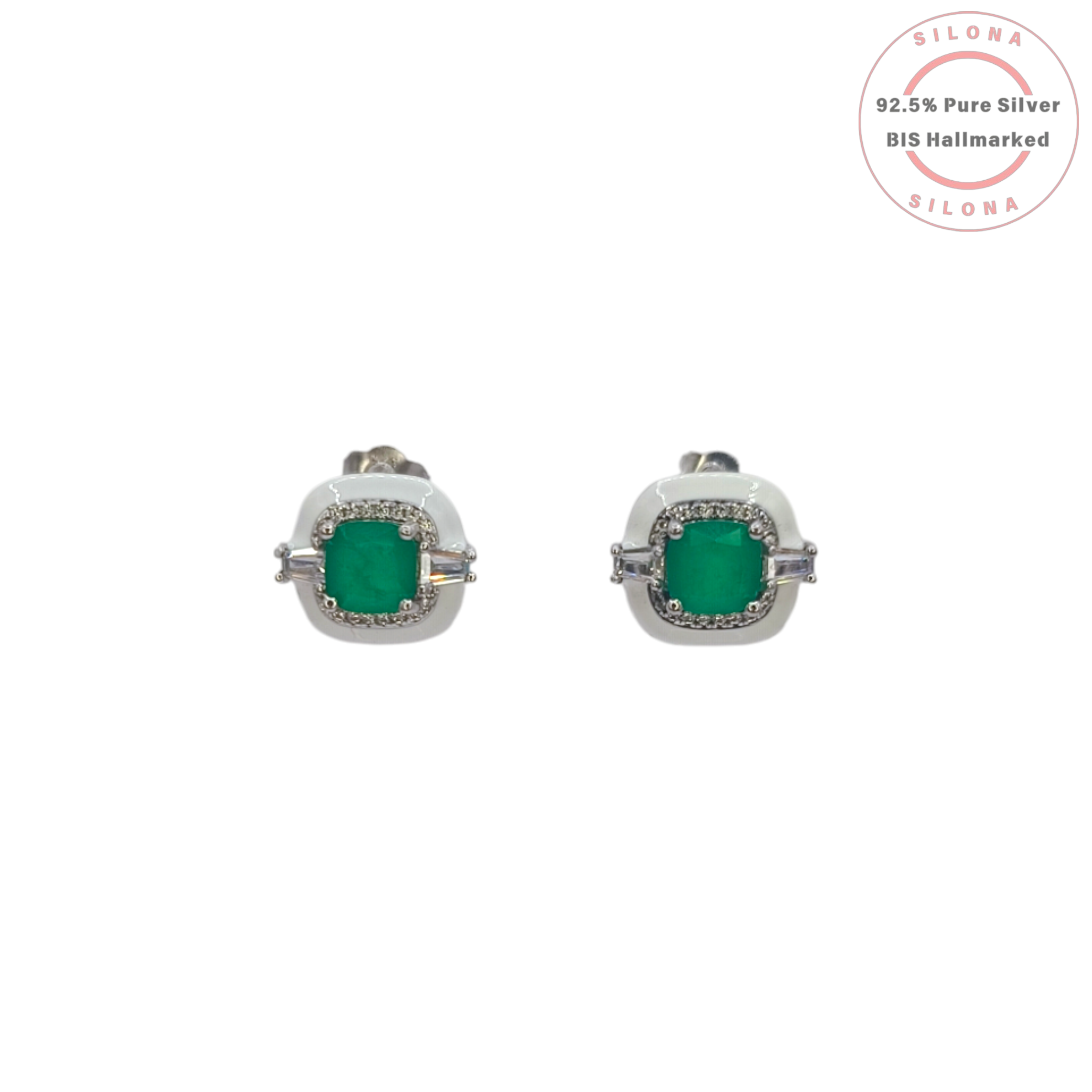 A pair of Art Deco style stud earrings featuring square-cut emerald green stones, surrounded by a white enamel frame and flanked by clear baguette cubic zirconia, crafted in 92.5 silver on a white background.