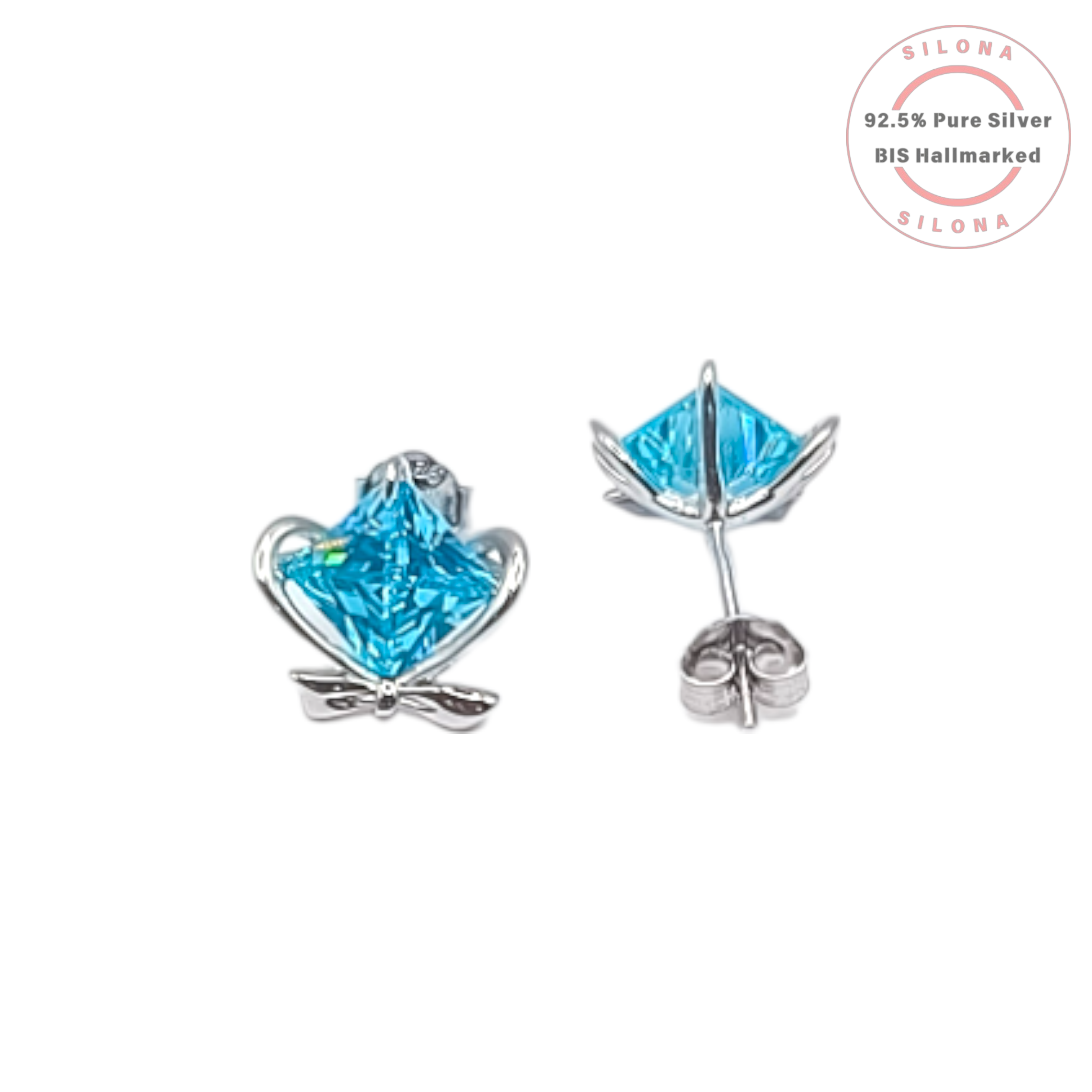 A pair of sterling silver stud earrings featuring a princess-cut, aqua blue cubic zirconia stone set within a delicate heart and bow design, on a white background.