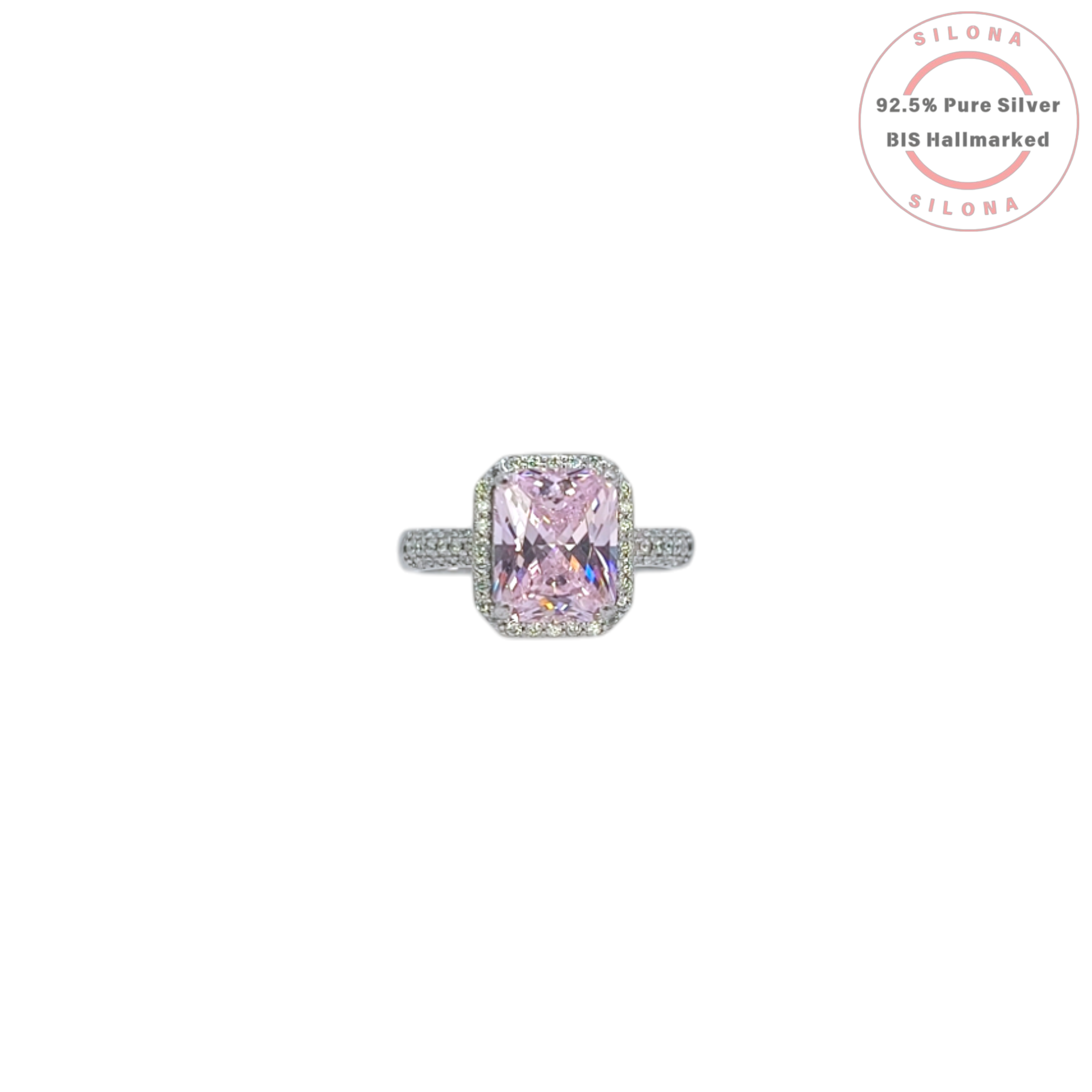 Statement halo ring with a large radiant-cut pink cubic zirconia center stone and a pave band, crafted in pure 92.5 silver.
