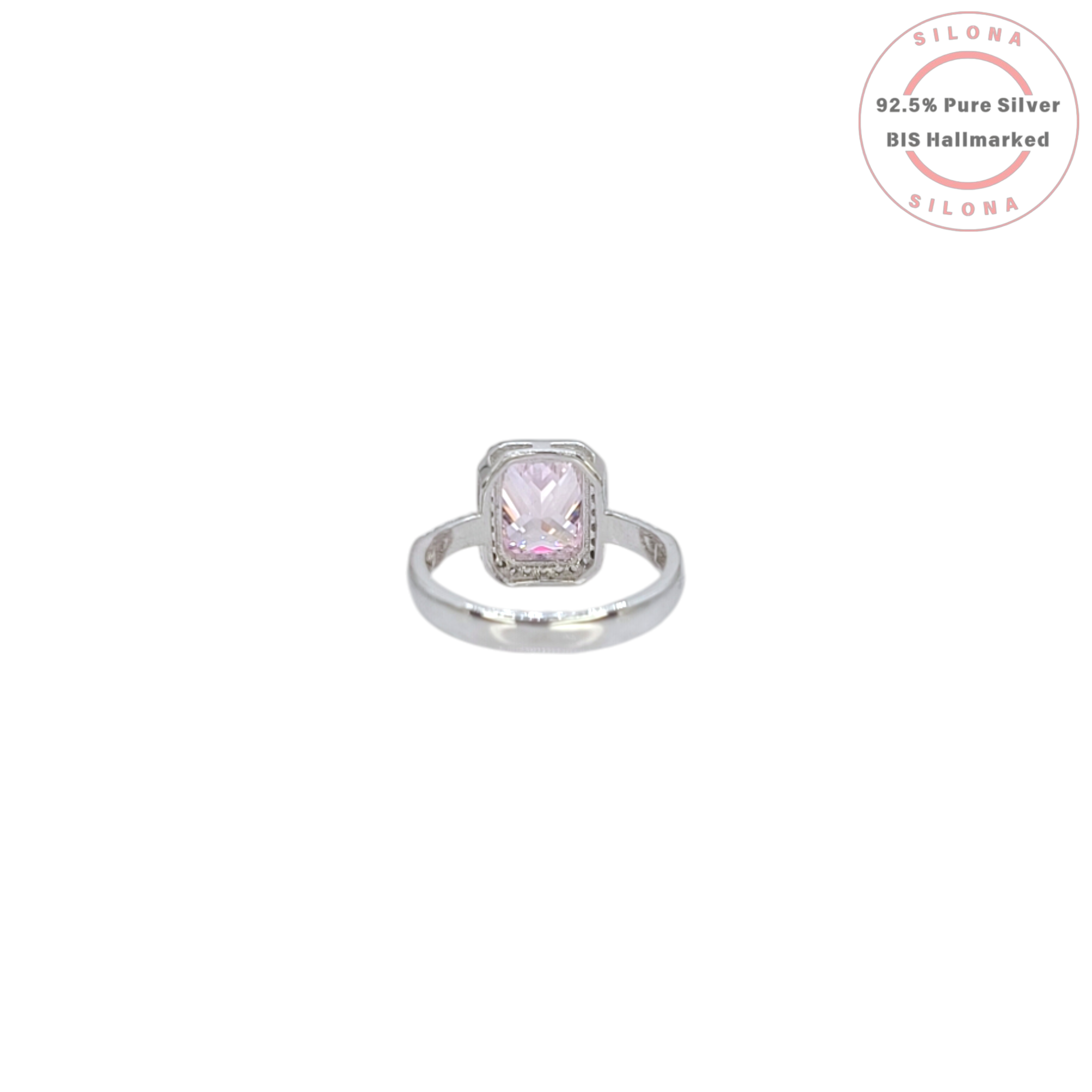 Statement halo ring with a large radiant-cut pink cubic zirconia center stone and a pave band, crafted in pure 92.5 silver.