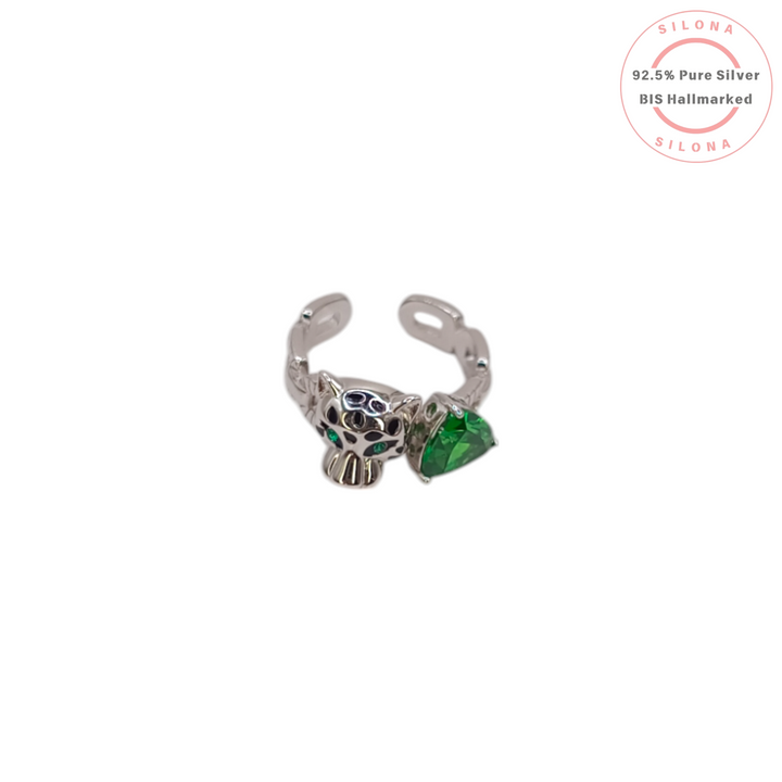 Silona Statement Panther Ring in 92.5 silver, featuring a panther head with black enamel spots, green stone eyes, and a large trillion-cut green stone.