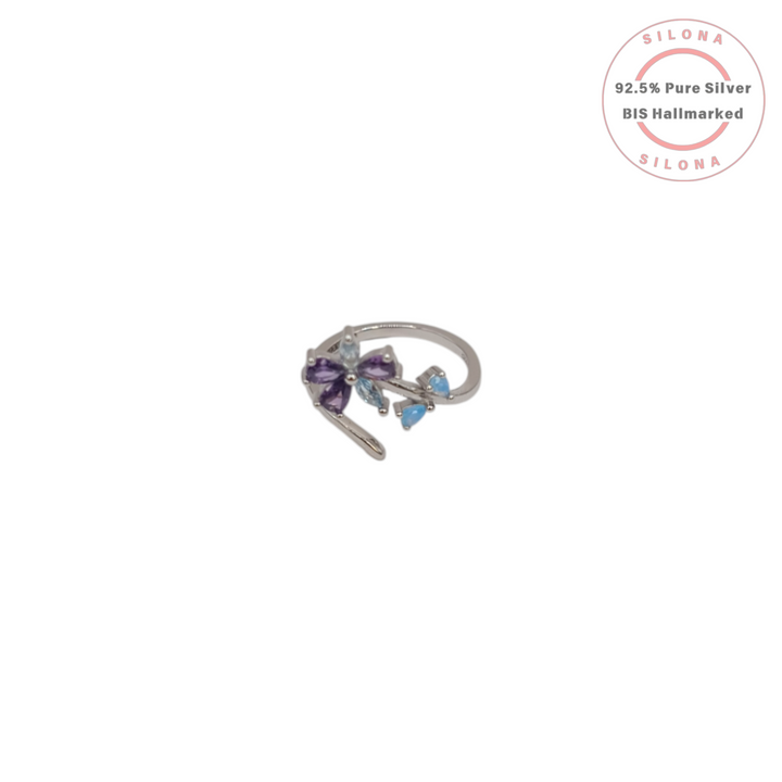 Silona's Whimsical Amethyst Hue Butterfly Vine Ring in 92.5 sterling silver, on a white background.