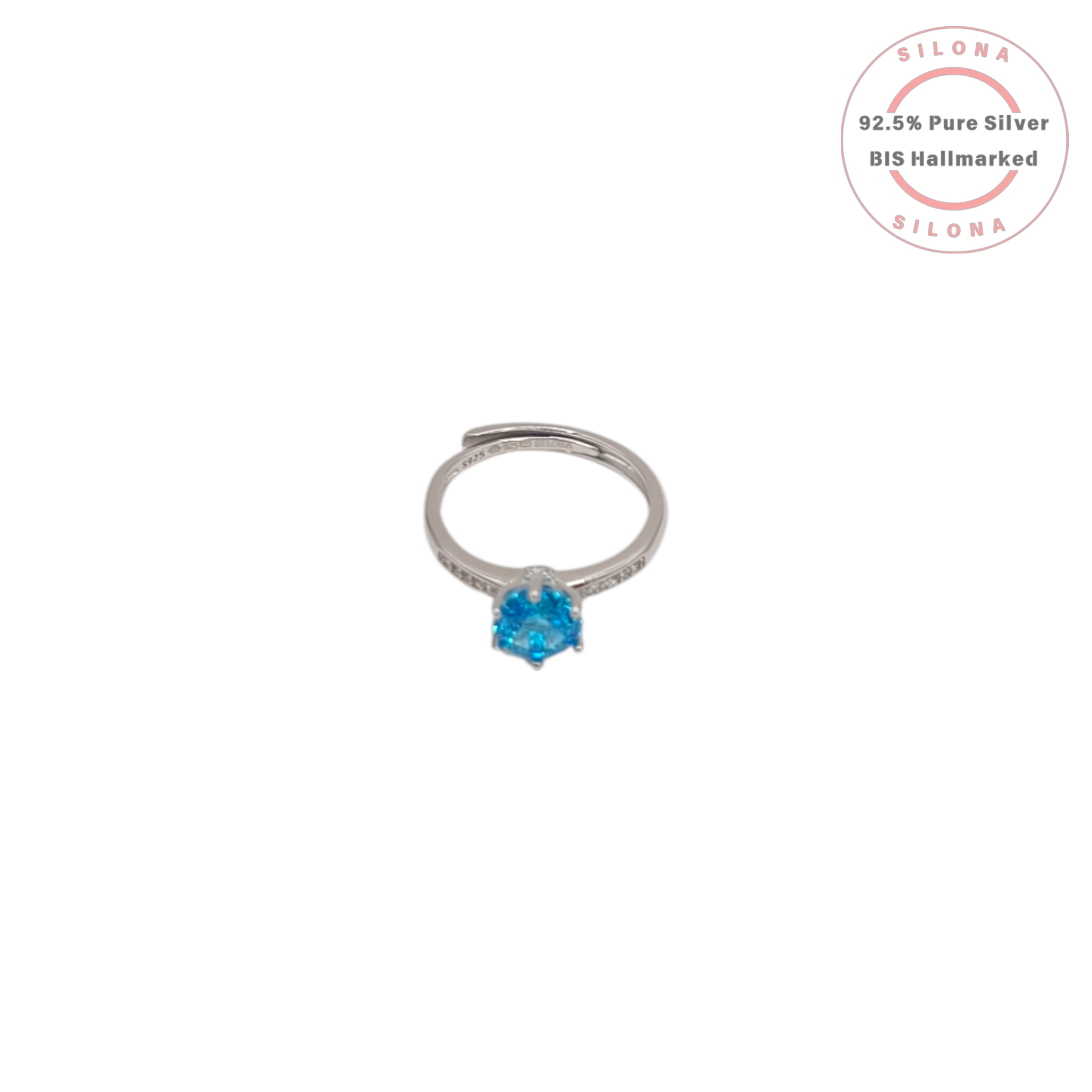 Adjustable solitaire ring in 92.5 silver with a central hexagonal-cut Swiss blue stone and pavé accents on the band.