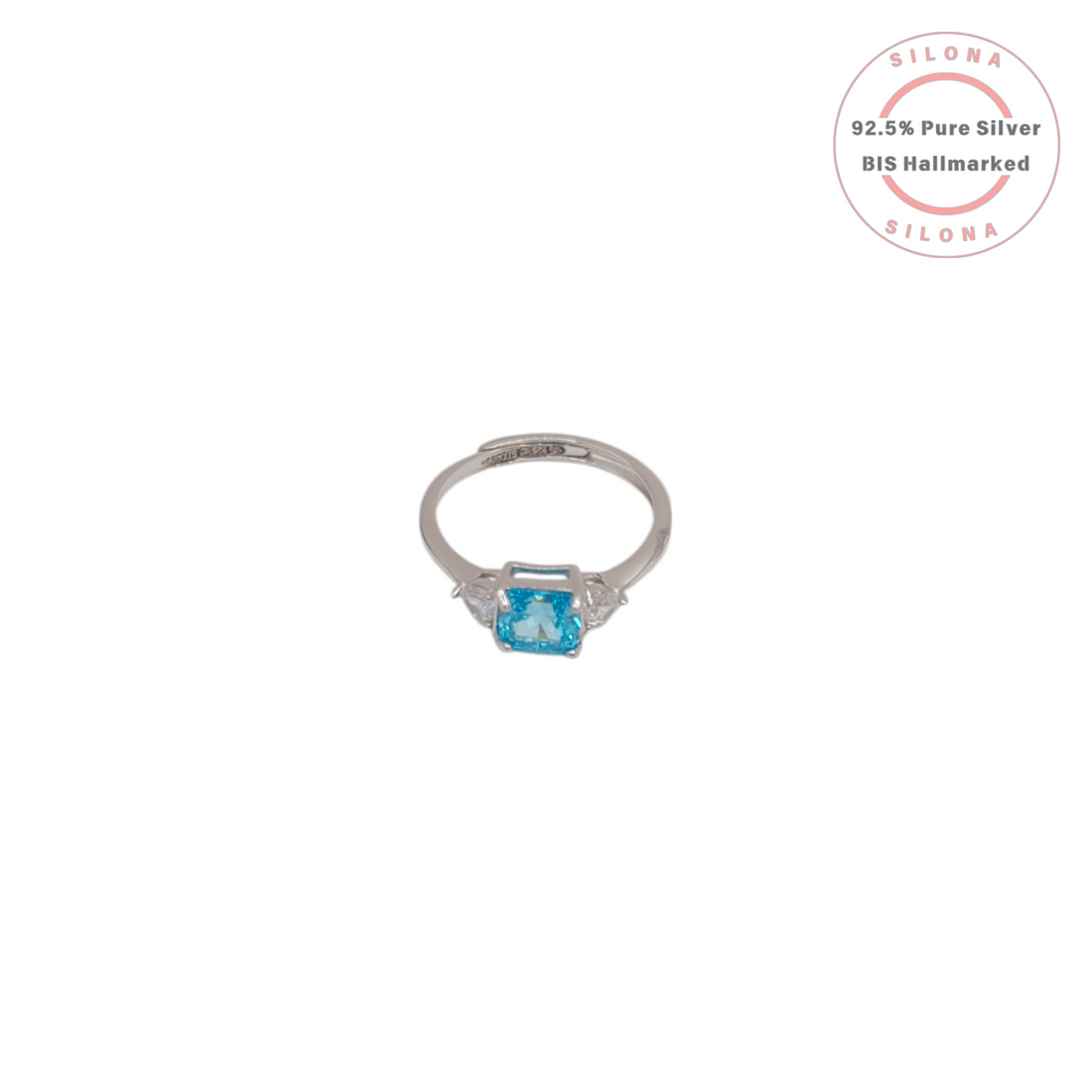 Front view of the Silona Classic Aquamarine Hue Solitaire Ring in 925 silver, showing the central light blue radiant-cut stone and two side stones on a white background.