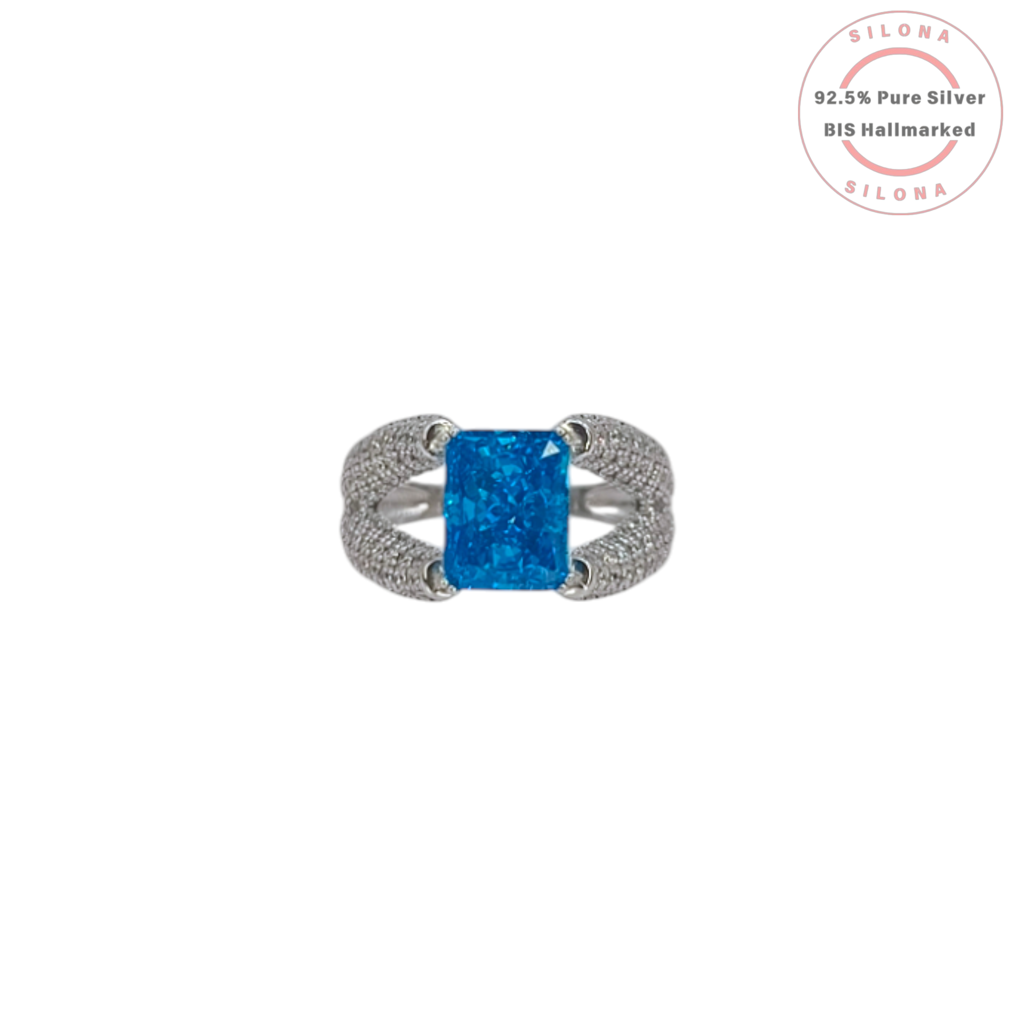 Statement silver ring featuring a large, rectangular Swiss blue cubic zirconia, set on a pavé-encrusted split shank band.