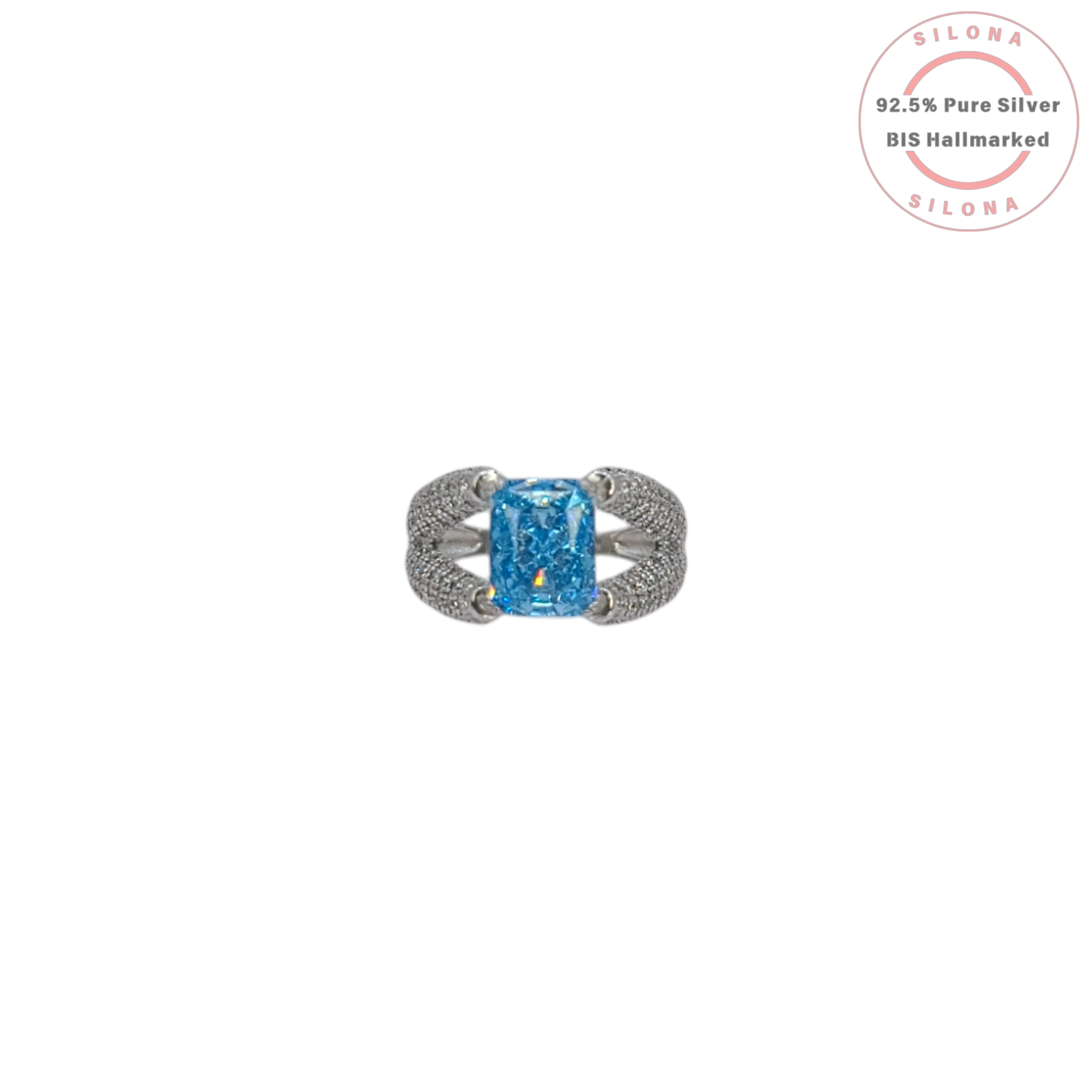 Statement silver ring featuring a large, rectangular Swiss blue cubic zirconia, set on a pavé-encrusted split shank band.