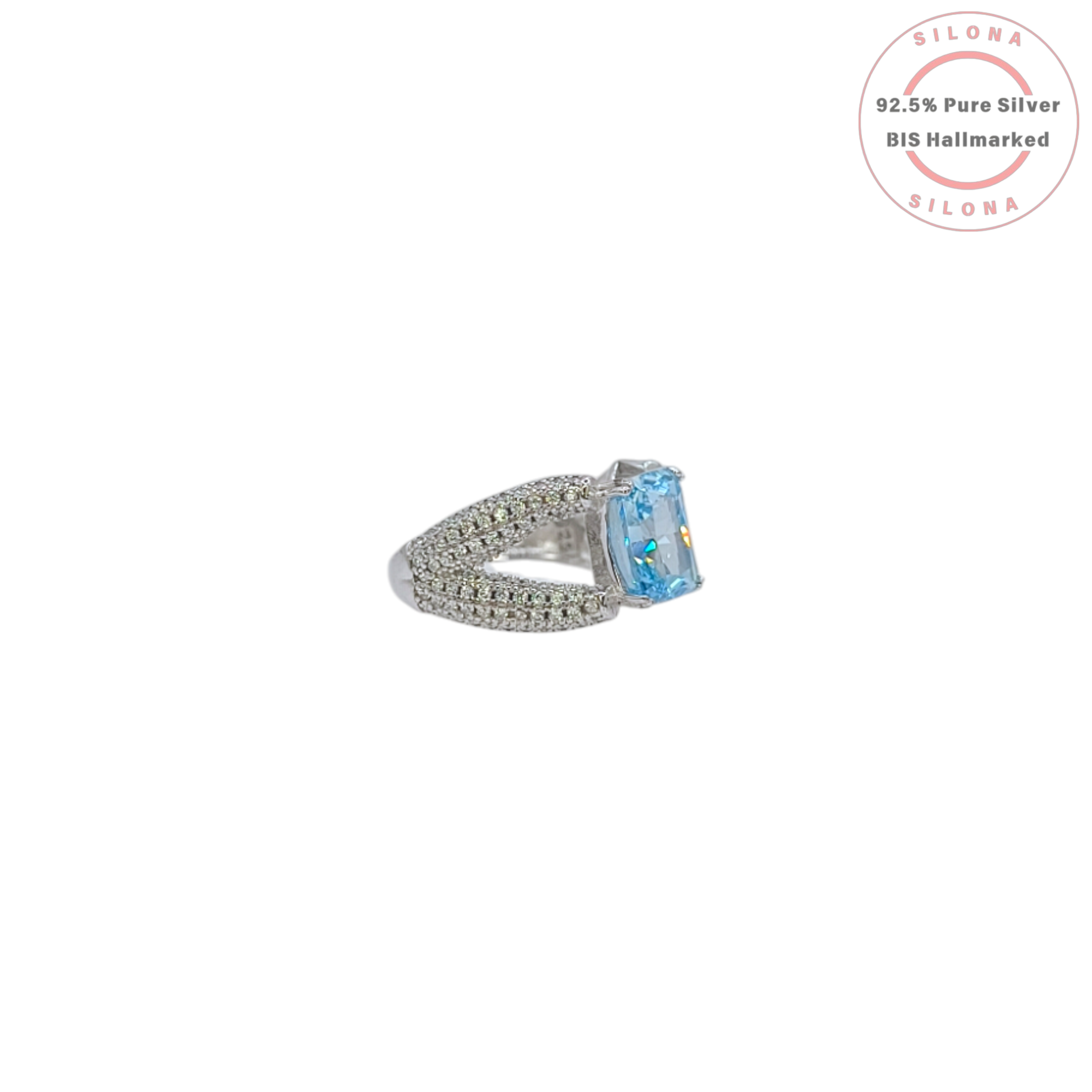 Statement silver ring featuring a large, rectangular Swiss blue cubic zirconia, set on a pavé-encrusted split shank band.