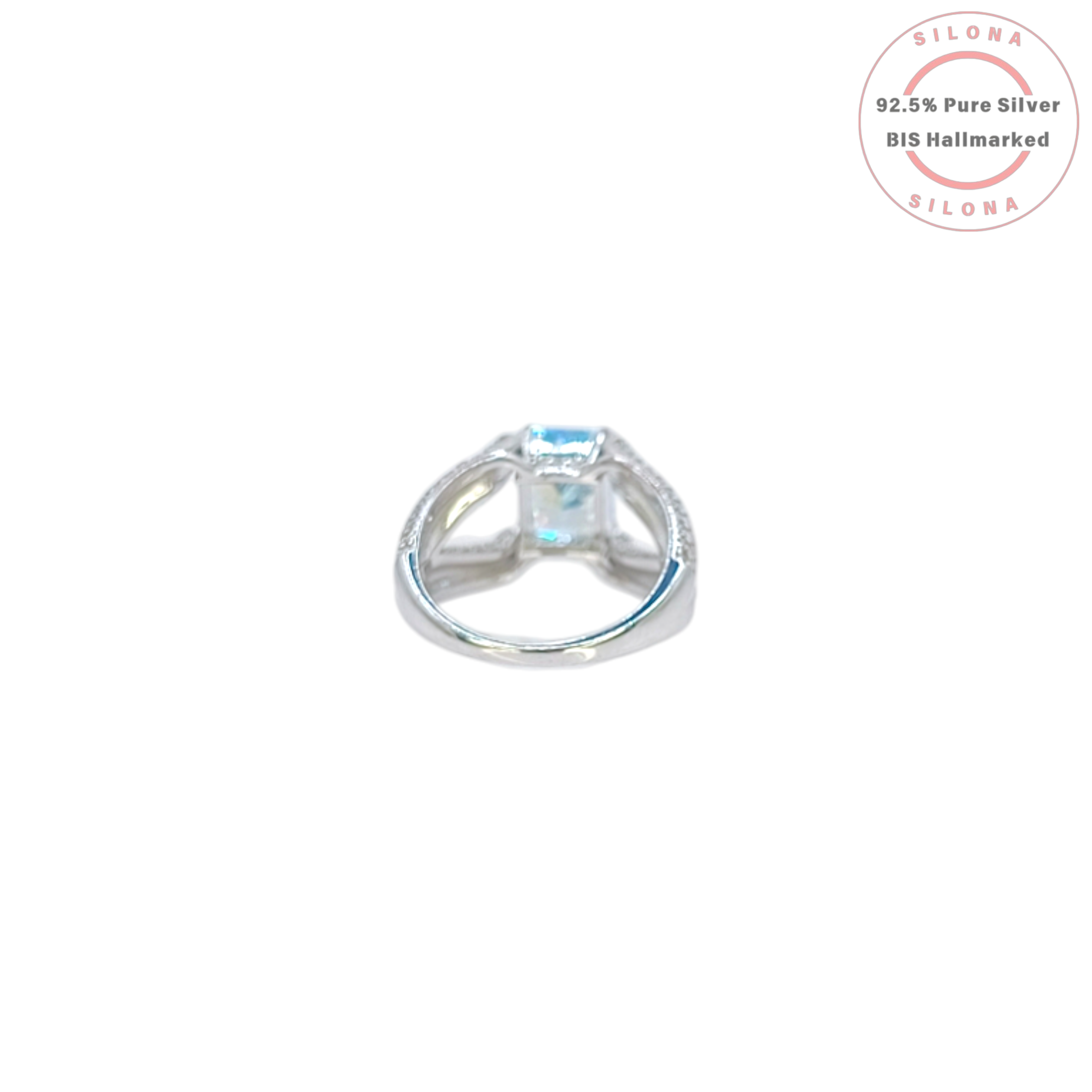 Statement silver ring featuring a large, rectangular Swiss blue cubic zirconia, set on a pavé-encrusted split shank band.