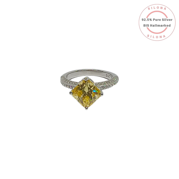 Front view of Silona's Canary Solitaire Pavé Silver Ring featuring a large cushion-cut yellow stone on a pavé band, crafted from 925 sterling silver.
