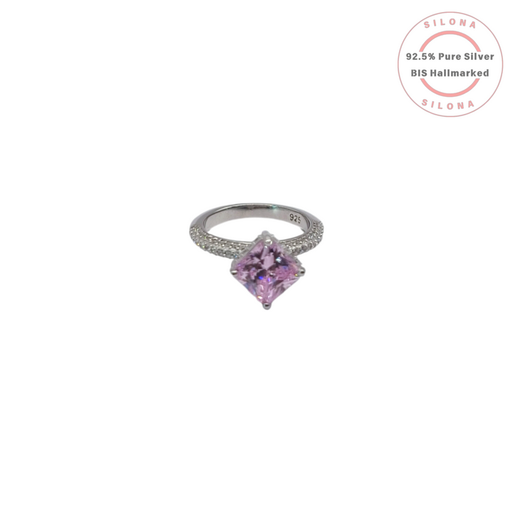 Front view of the Silona Pavé Rosé Cushion Cut Solitaire Ring, showcasing the large pink central stone and the pavé cubic zirconia band, crafted in 92.5 silver.