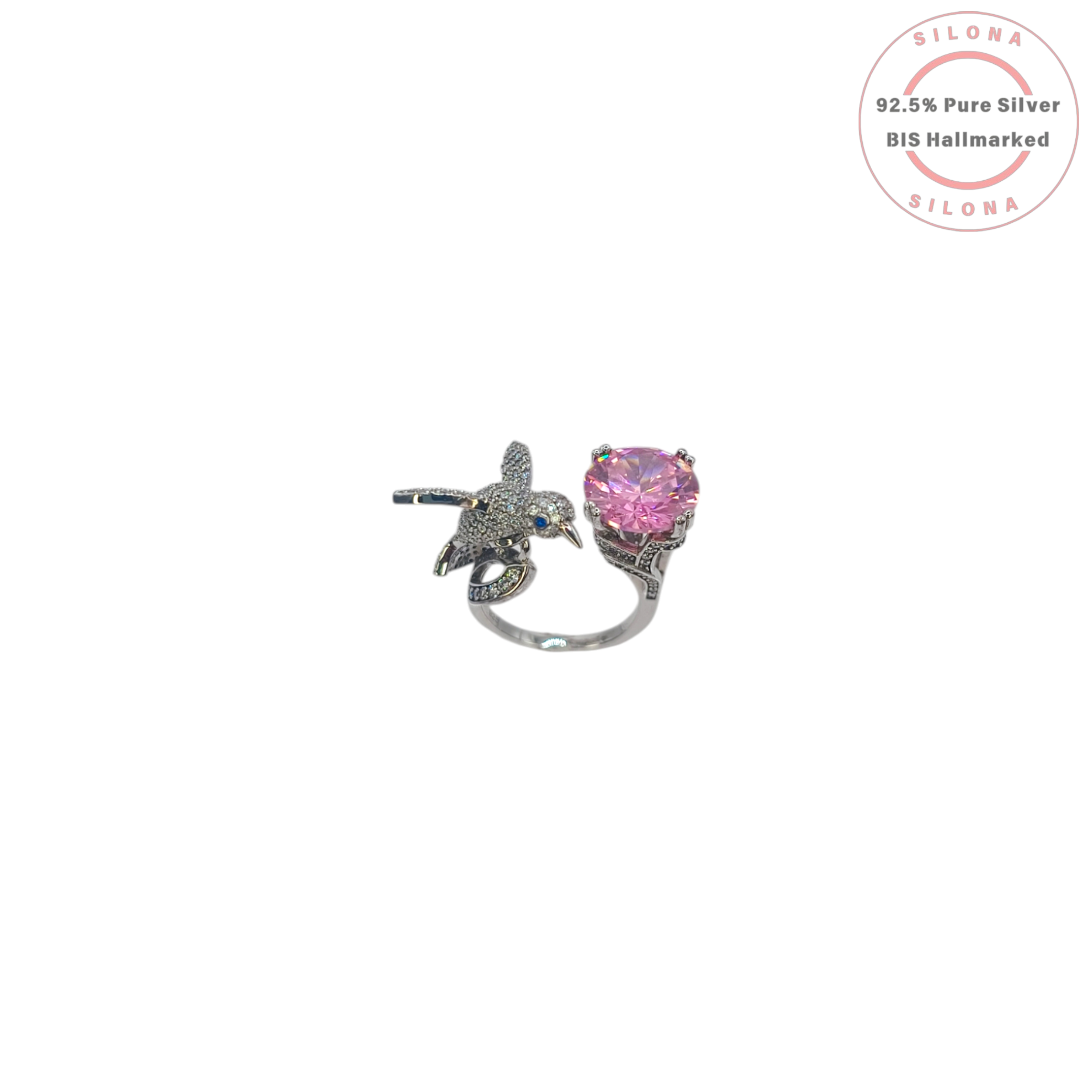 Silona Whimsical Hummingbird Ring in 92.5 Silver, featuring a pavé-set bird motif with a blue eye and a large round pink cubic zirconia stone on an open shank.