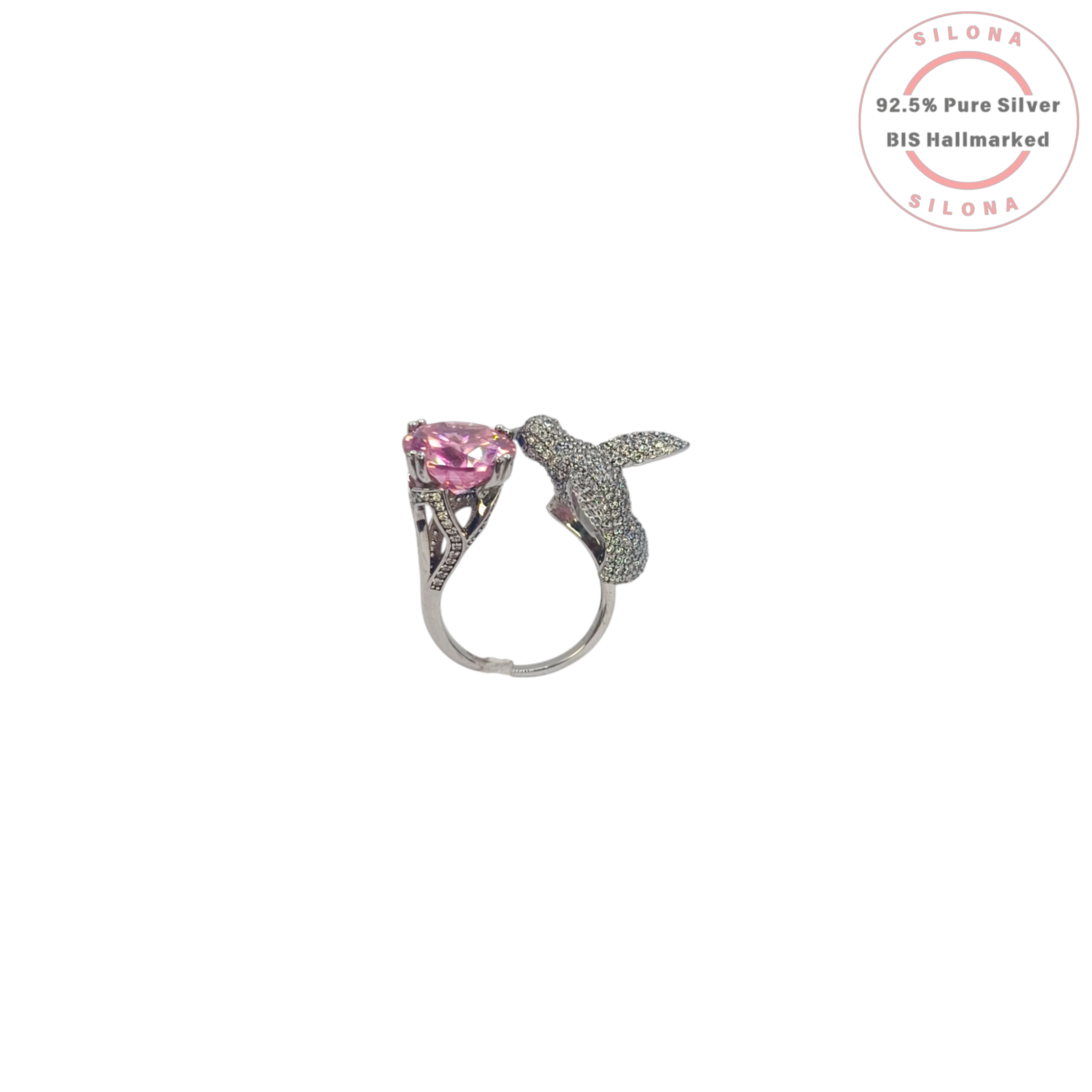 Silona Whimsical Hummingbird Ring in 92.5 Silver, featuring a pavé-set bird motif with a blue eye and a large round pink cubic zirconia stone on an open shank.