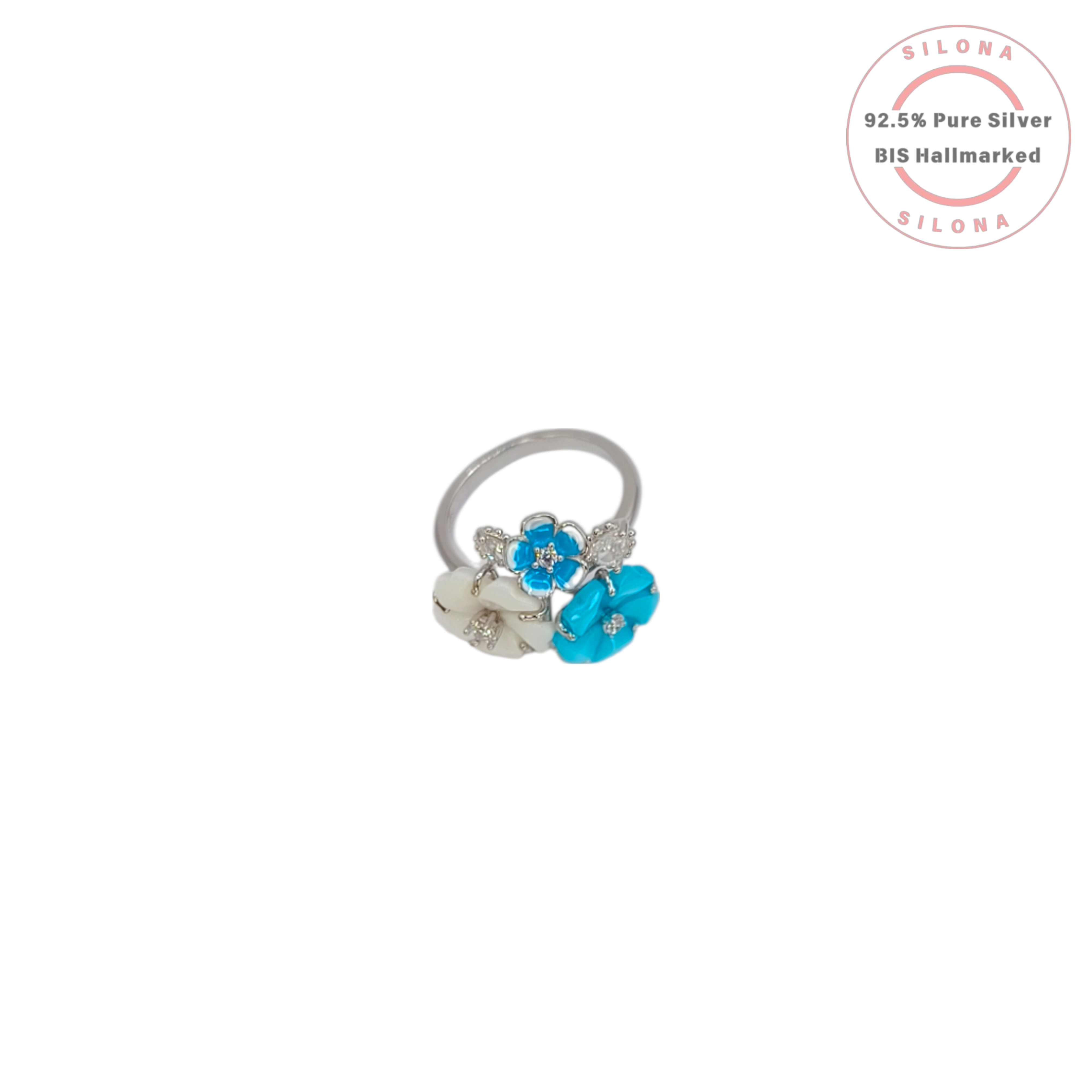 Side view of a floral cluster ring in sterling silver, featuring turquoise blue and mother of pearl petals surrounding a central clear stone.