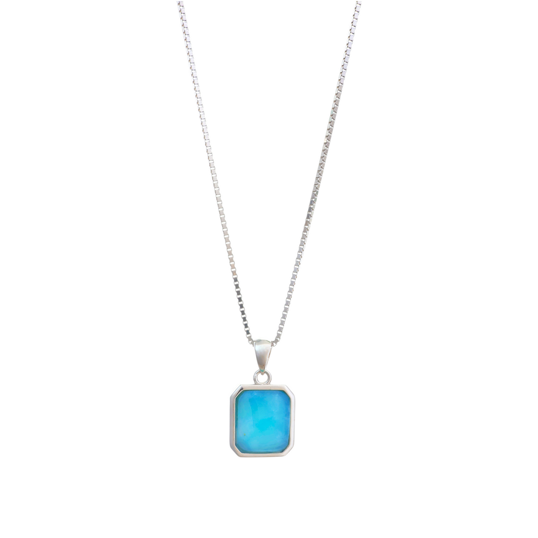 A silver box chain necklace featuring a rectangular ocean-blue Larimar cabochon pendant set in a sleek silver bezel frame.