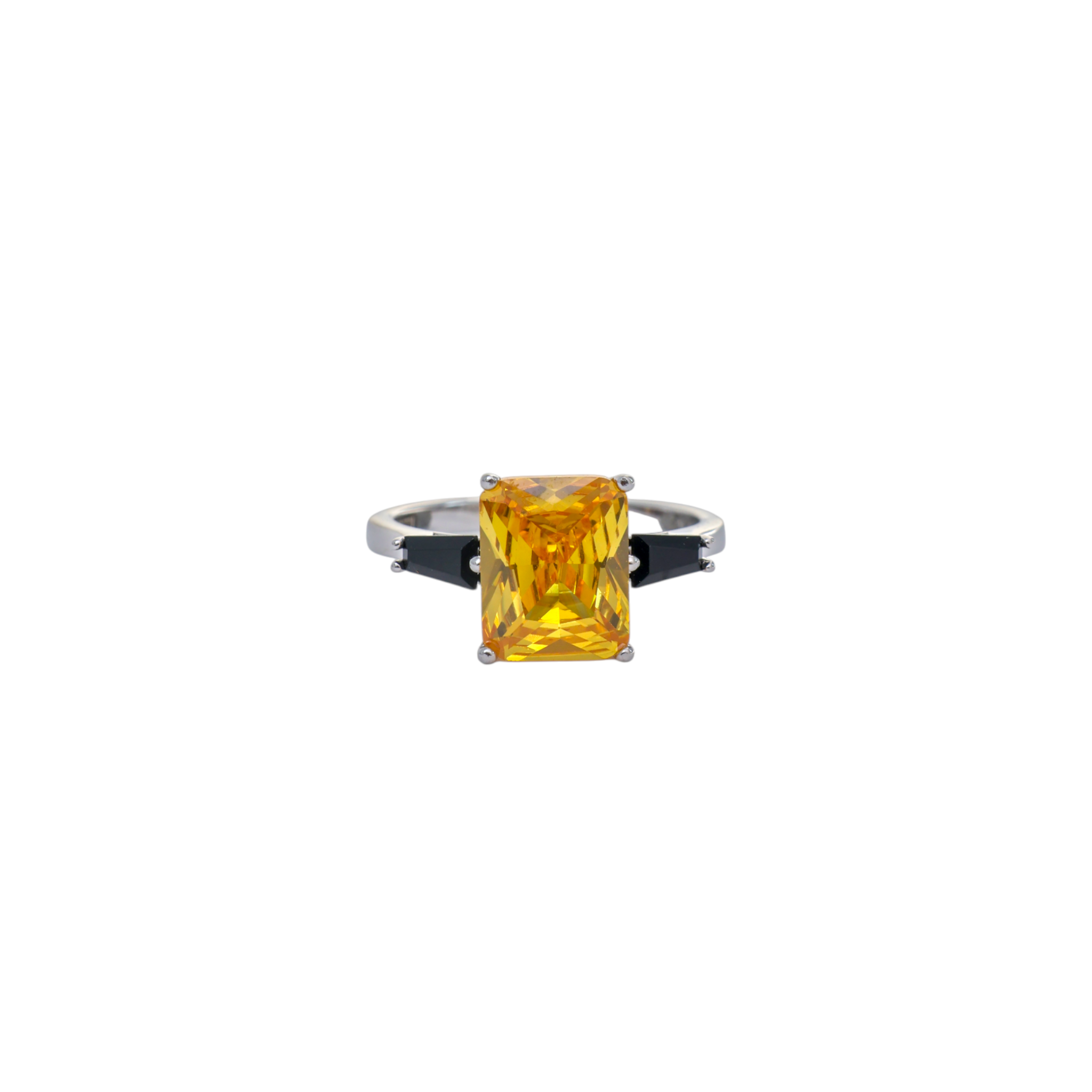 Radiant cut canary yellow stone ring flanked by black baguette gems in sterling silver.